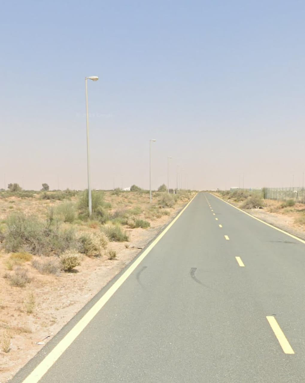Commercial land for sale in Sharjah, Rawdat Al Qurt area, Al Ruwaidat suburb.
