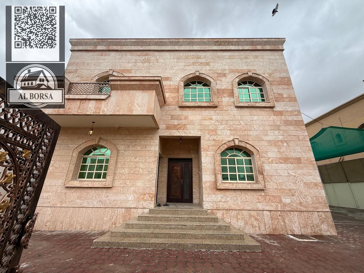 For rent a villa in Al MOAIHAT 2 in Ajman, 5 master bedrooms, a majlis, a hall, a maid's room, and a store