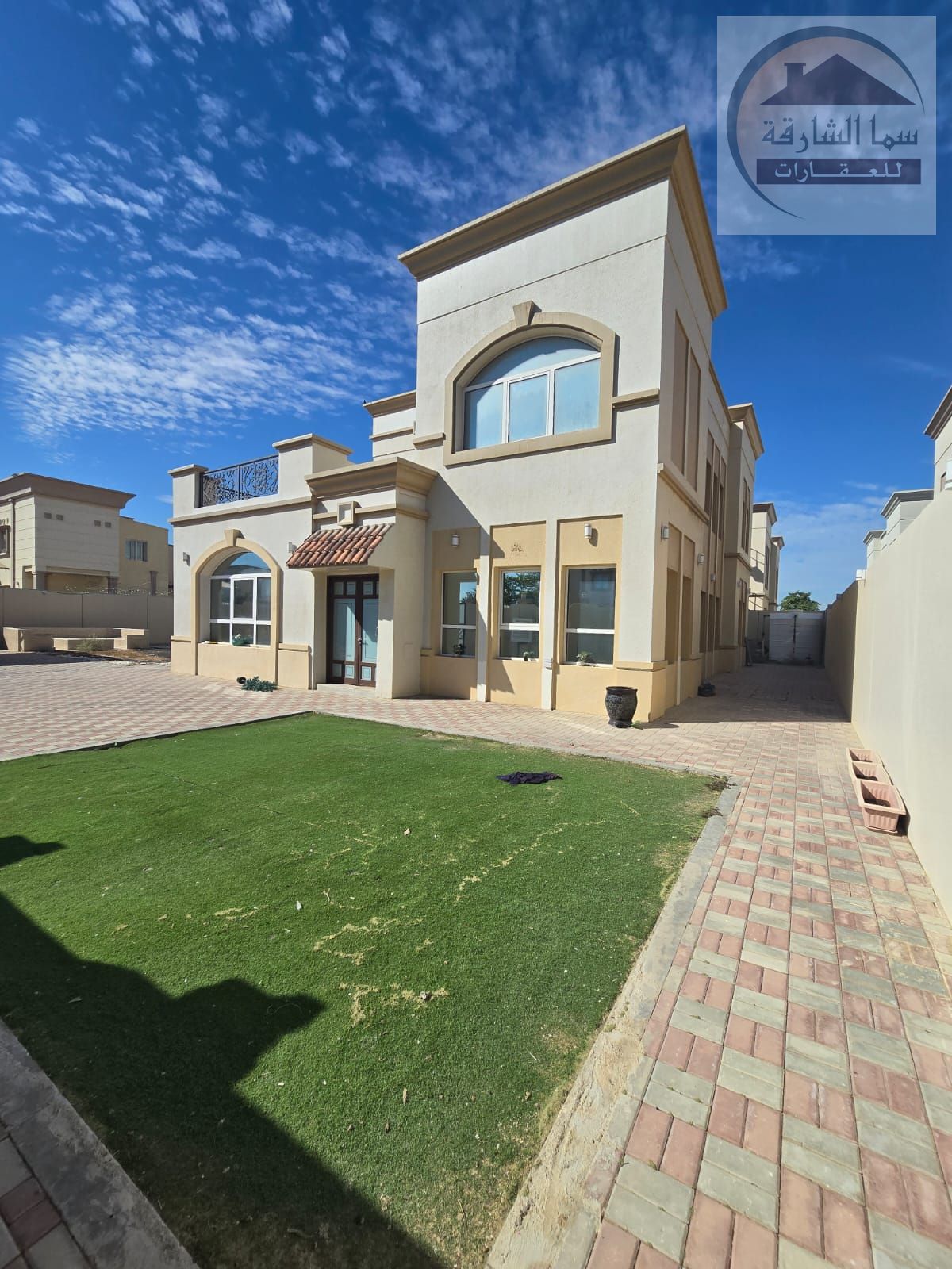 Two-story villa for rent in Al-Ruqaiba 5 area, Al-Suyouh suburb. Excellent location on a main road, very close to Maliha Road and Emirates Bypass Road
