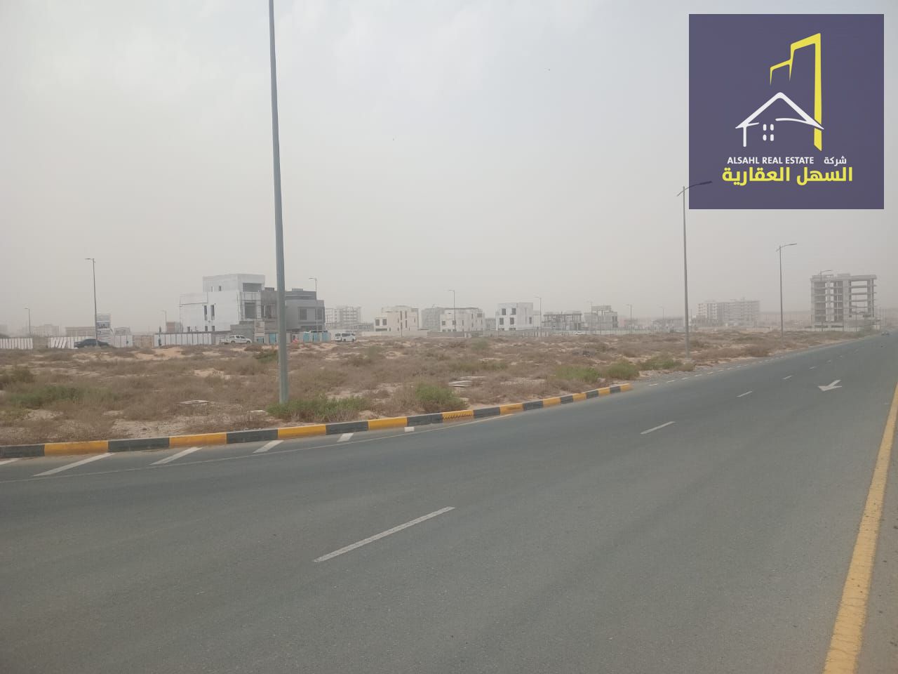 Residential/commercial land for sale in the Tilal area. Excellent location on a 24-meter street