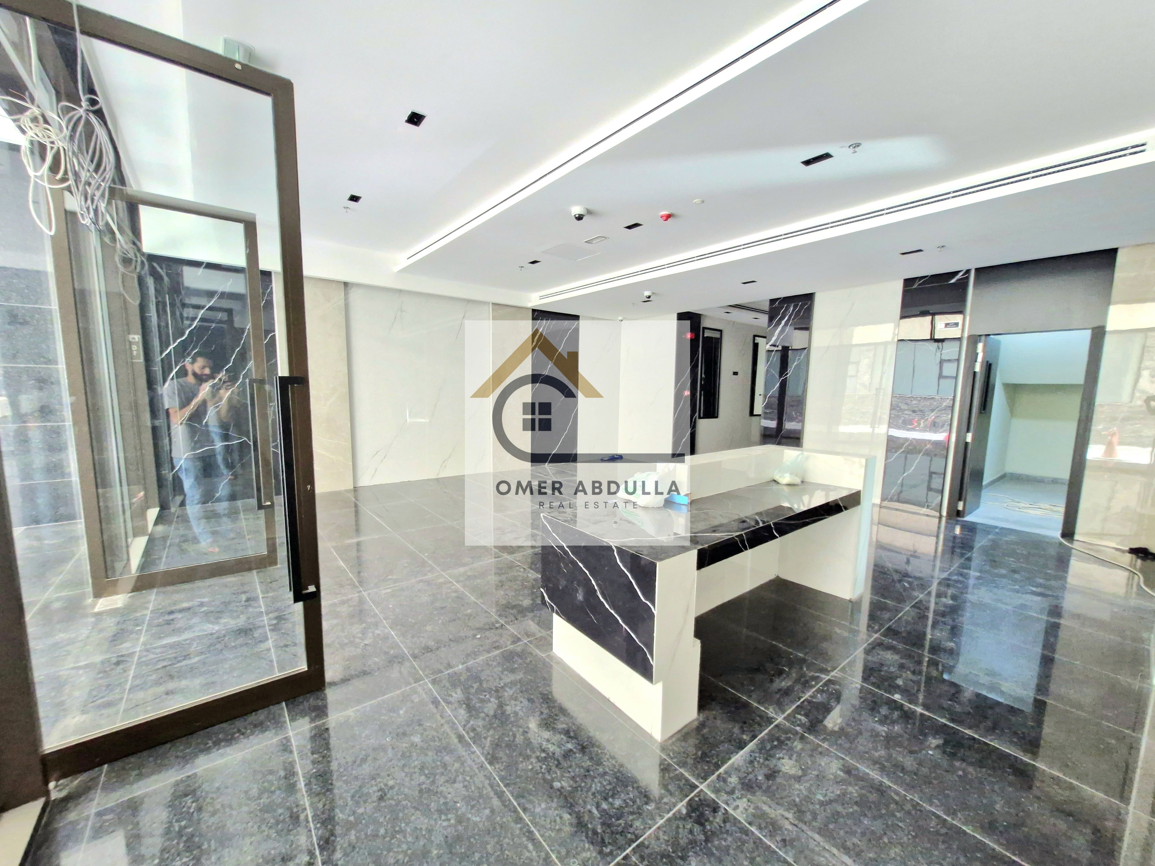Brand new Luxury 1bhk Apartment with balcony,wardrobes and covered parking For Family In Muwaileh Commercial