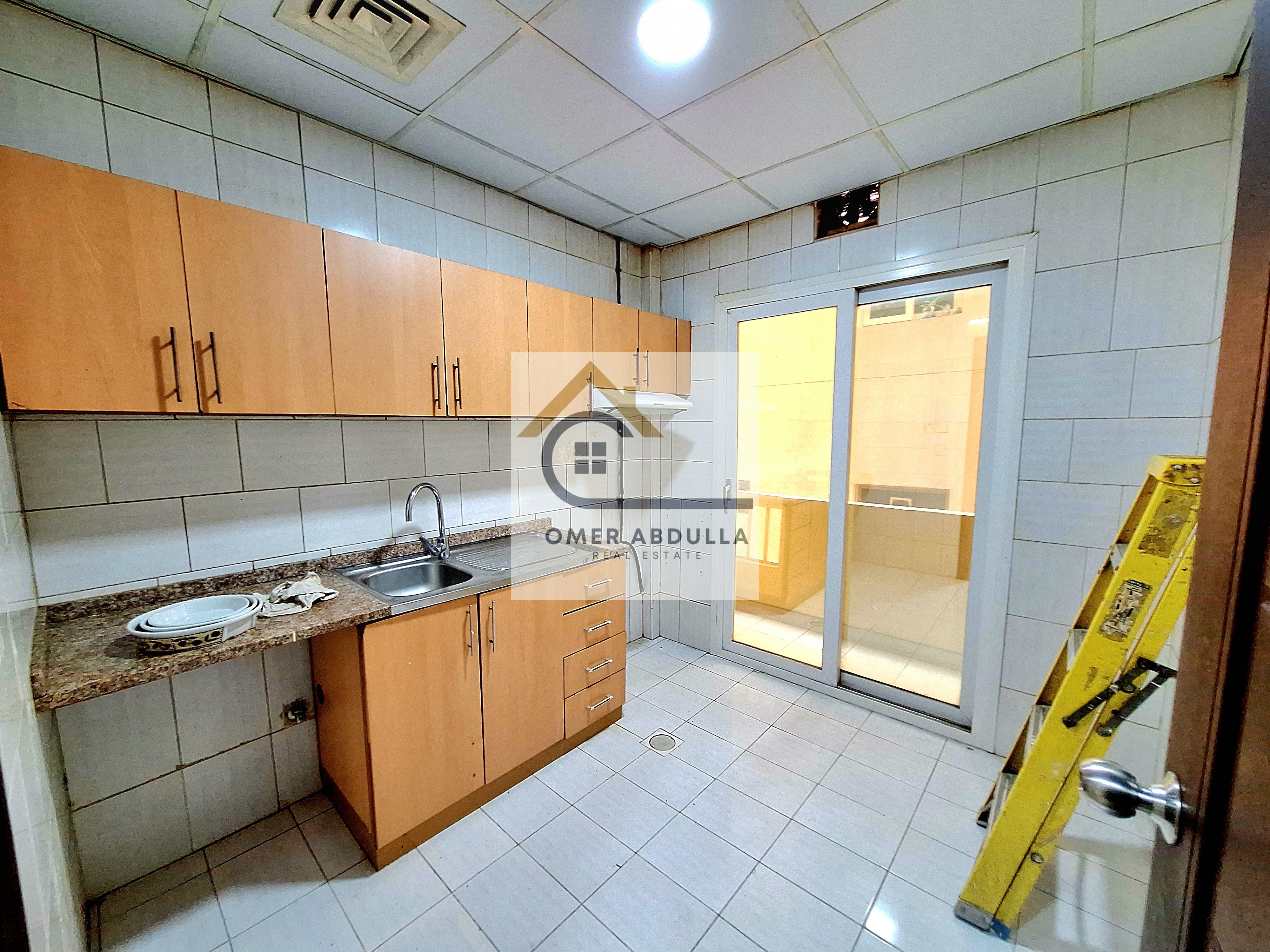 LIKE BRAND NEW 1BHK APARTMENT WITH BALCONY NO DEPOSIT CASH IN MUWEILAH AREA
