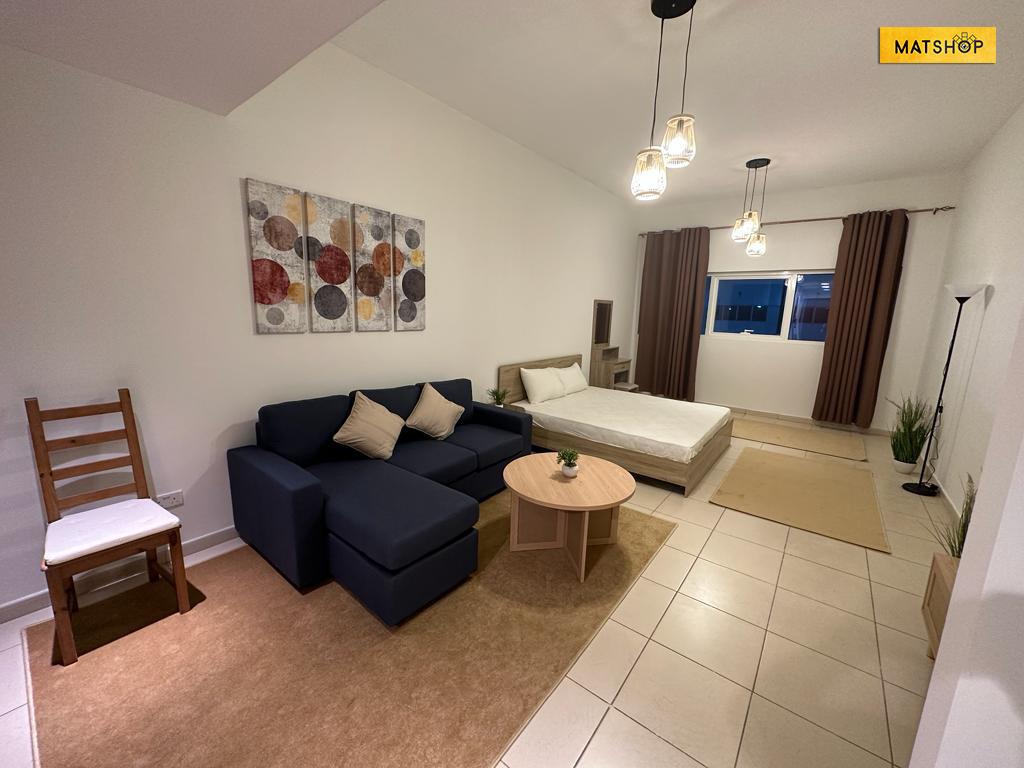 Furnished studio apartment with hotel-style furnishings in Ajman, Al Rashidiya area