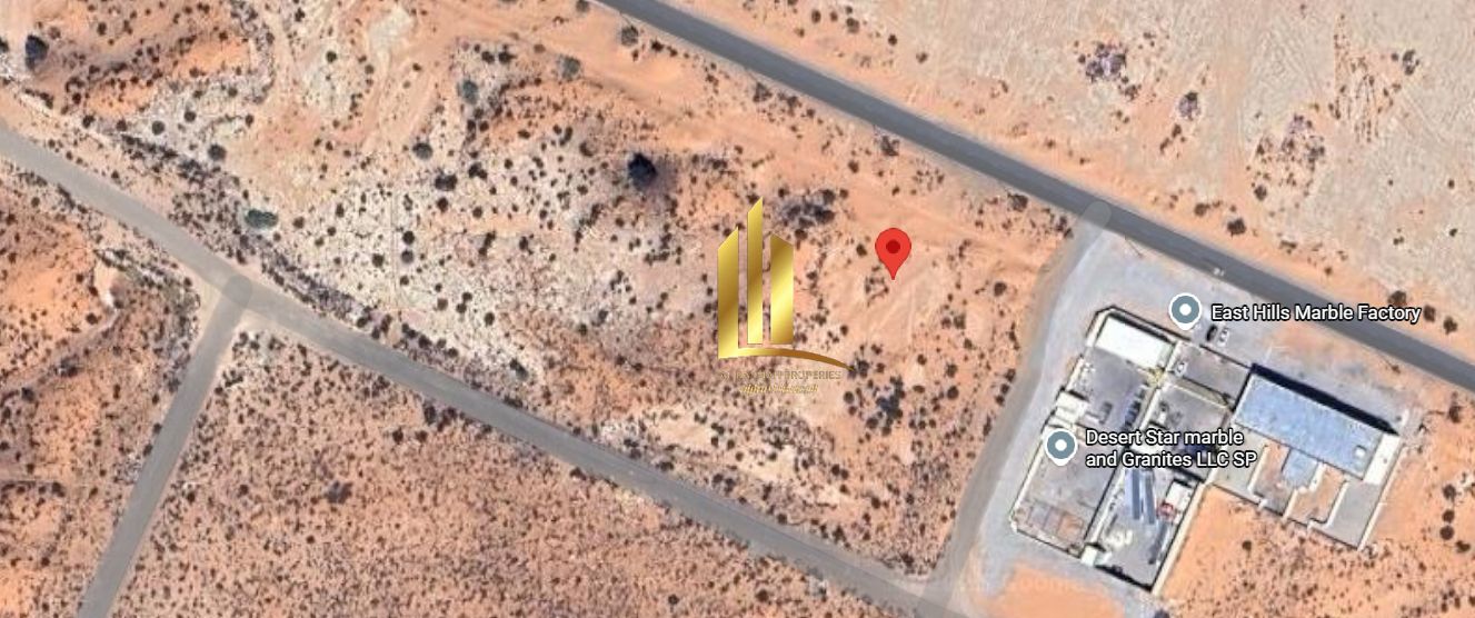 Land for Sale Al sajaa industrial Area opposite Al Hanoo Al Jaleel on a paved (asphalt) road.