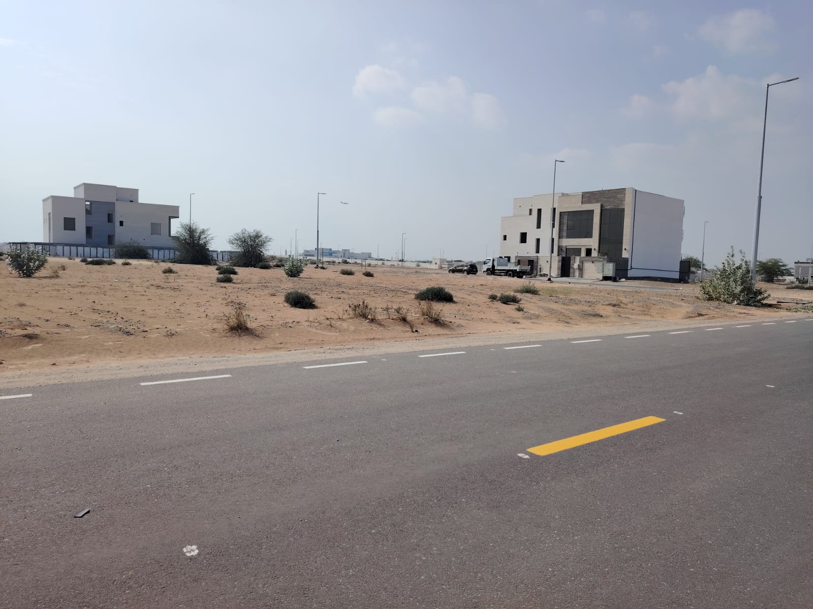 Residential Plot for Sale in Al Mazairah – Prime Location Near Parks