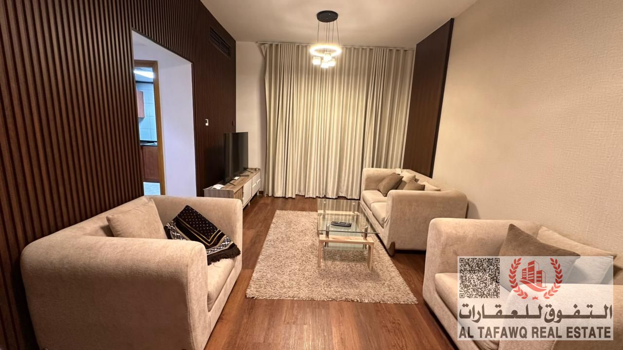 A furnished apartment consisting of a bedroom, a living room, a bathroom, and a balcony with an exterior view, including electricity, water, and inter