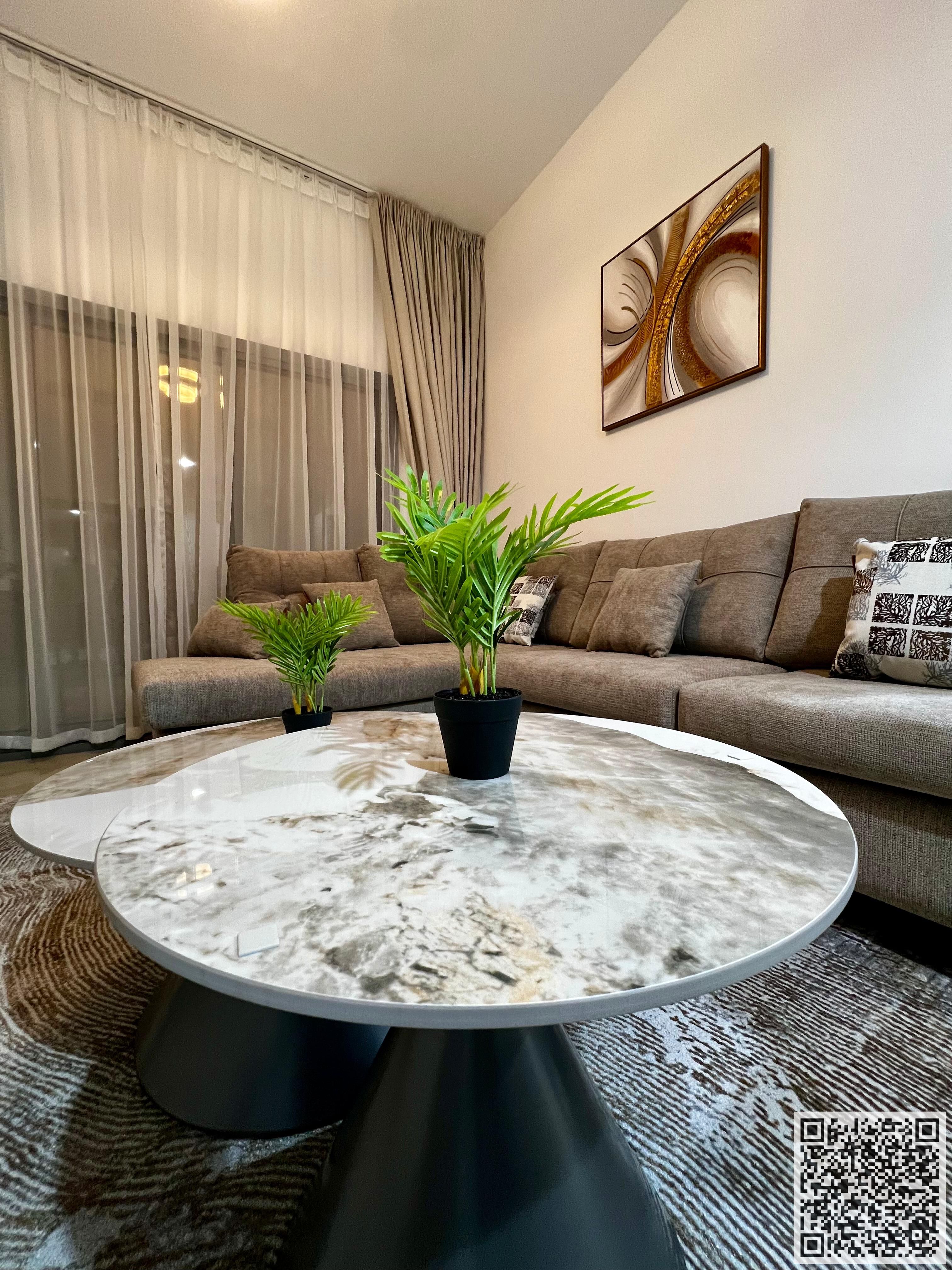 First resident, the most luxurious and beautiful furnished one-bedroom apartment for monthly rent in Ajman, spacious area, VIP furniture, super deluxe