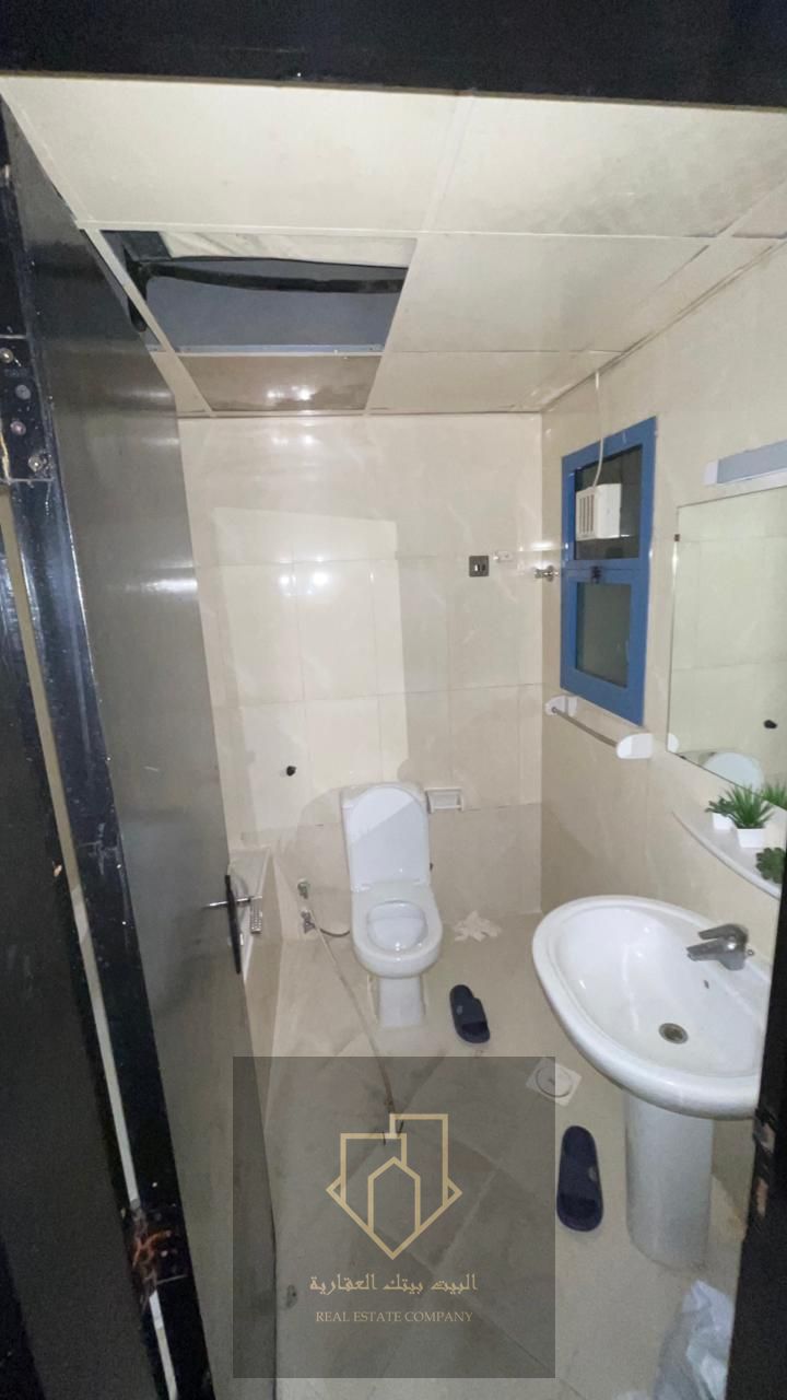 Luxury three-bedroom apartment for sale in Al Nuaimiya Towers, Ajman, with an area of 2,390 square feet, modern design, ready for occupancy, with a