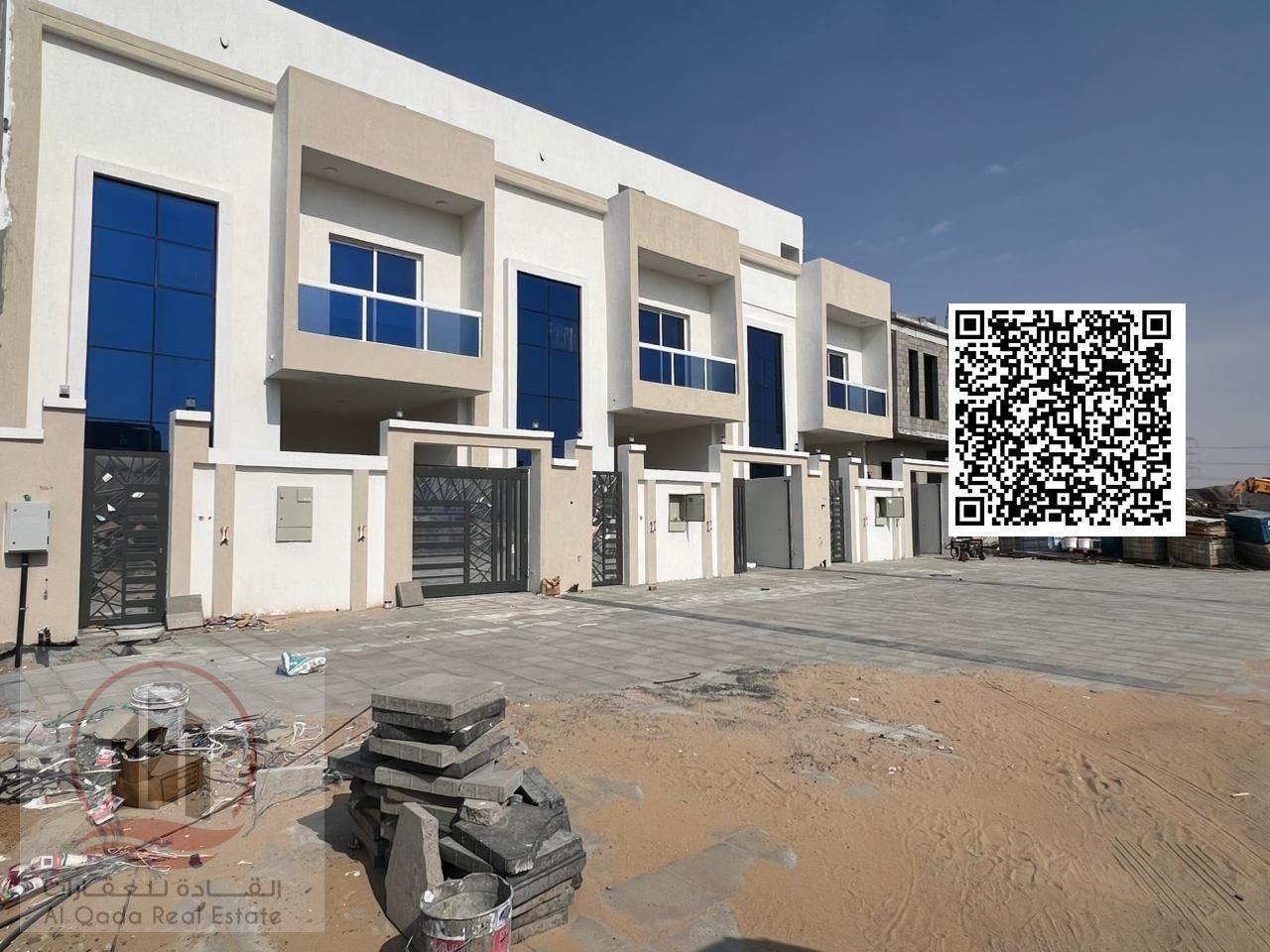 Villa for sale in Al Helio area, Ajman. Modern design. The villa includes registration fees and features 4 master bedrooms, a living room, a majlis