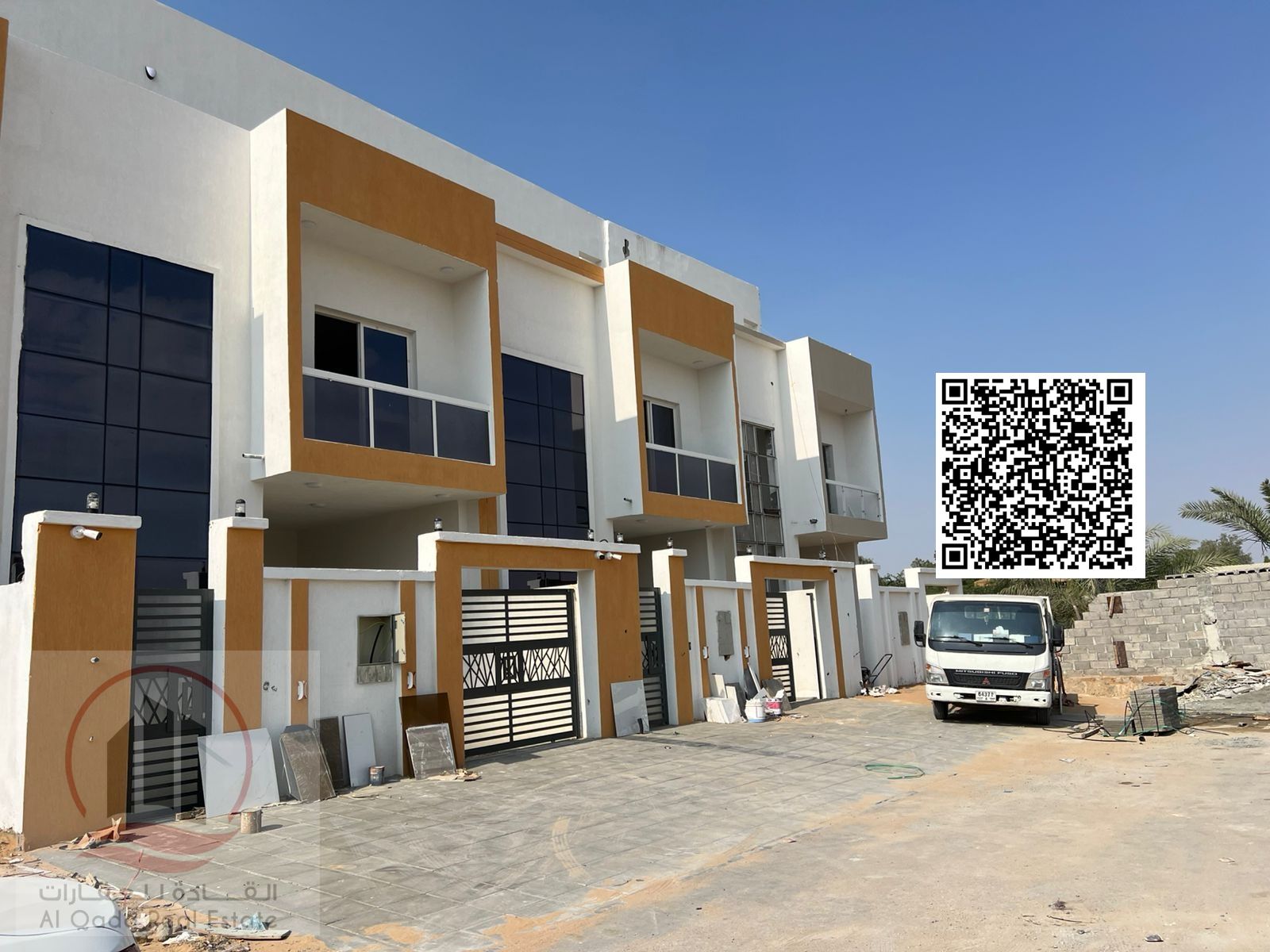Villa for sale in Al Helio area, Ajman. Modern design. The villa includes registration fees and features 4 master bedrooms, a living room, a majlis