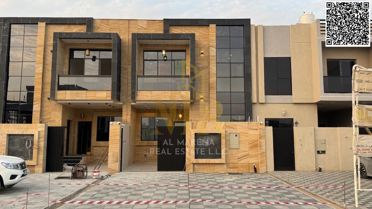 Two-story villa in Al-Haliyo 2 with five master bedrooms, complete specifications, and a price including registration fees.
