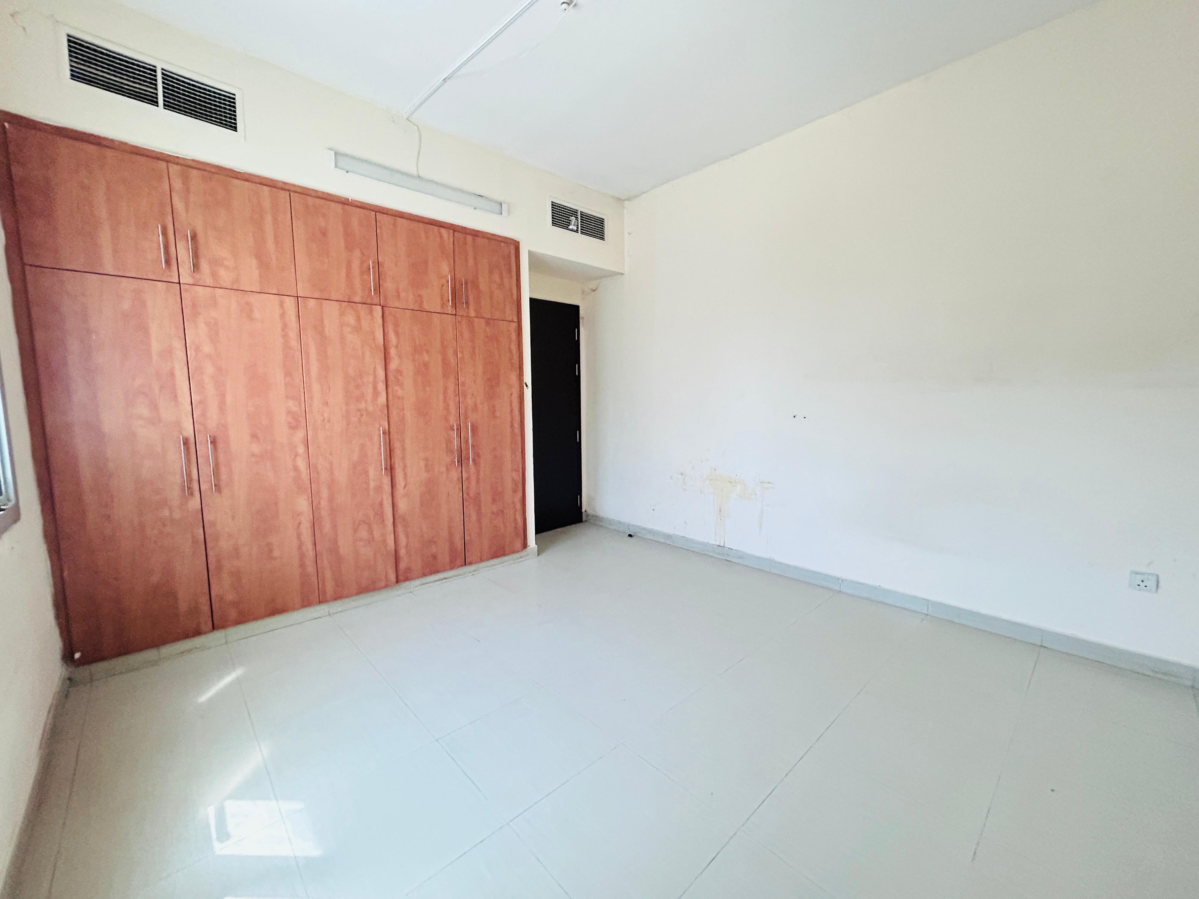 Cozy 2BHK Maid Room Wardrobes Balcony Central AC Prime Location For Family