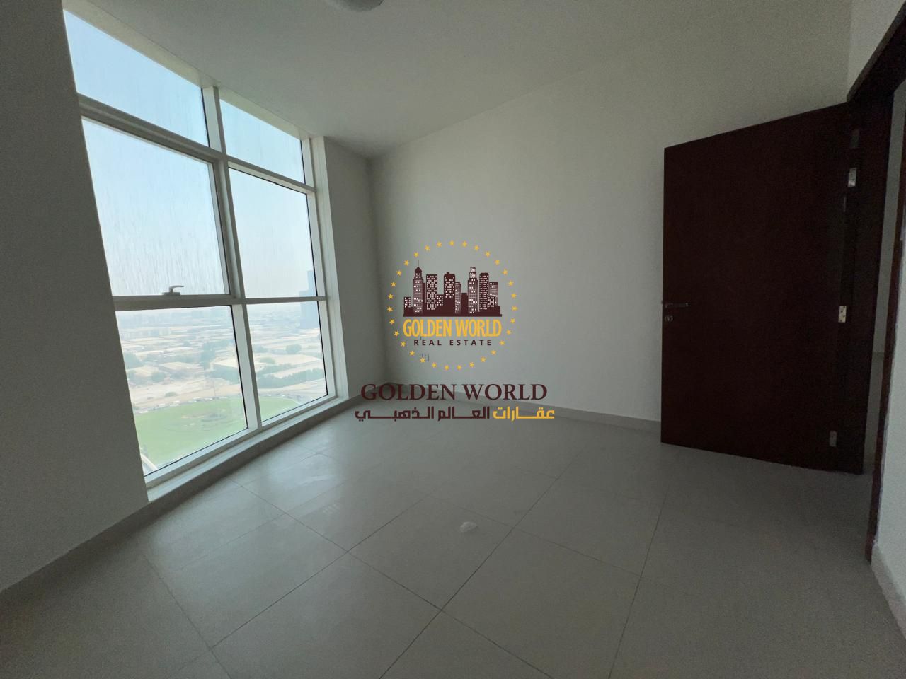 Two-bedroom apartment with a living room in Al Taawun, featuring a master bedroom and available parking. Practical and comfortable design in a prime l