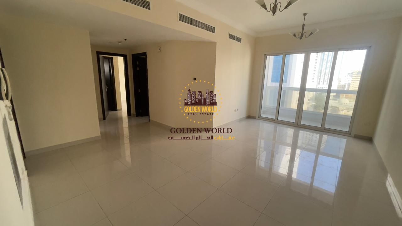 Two-bedroom apartment with balcony for rent in Sharjah Al Majaz 2, central AC, two master bedrooms, free parking, panoramic open view, spacious layout