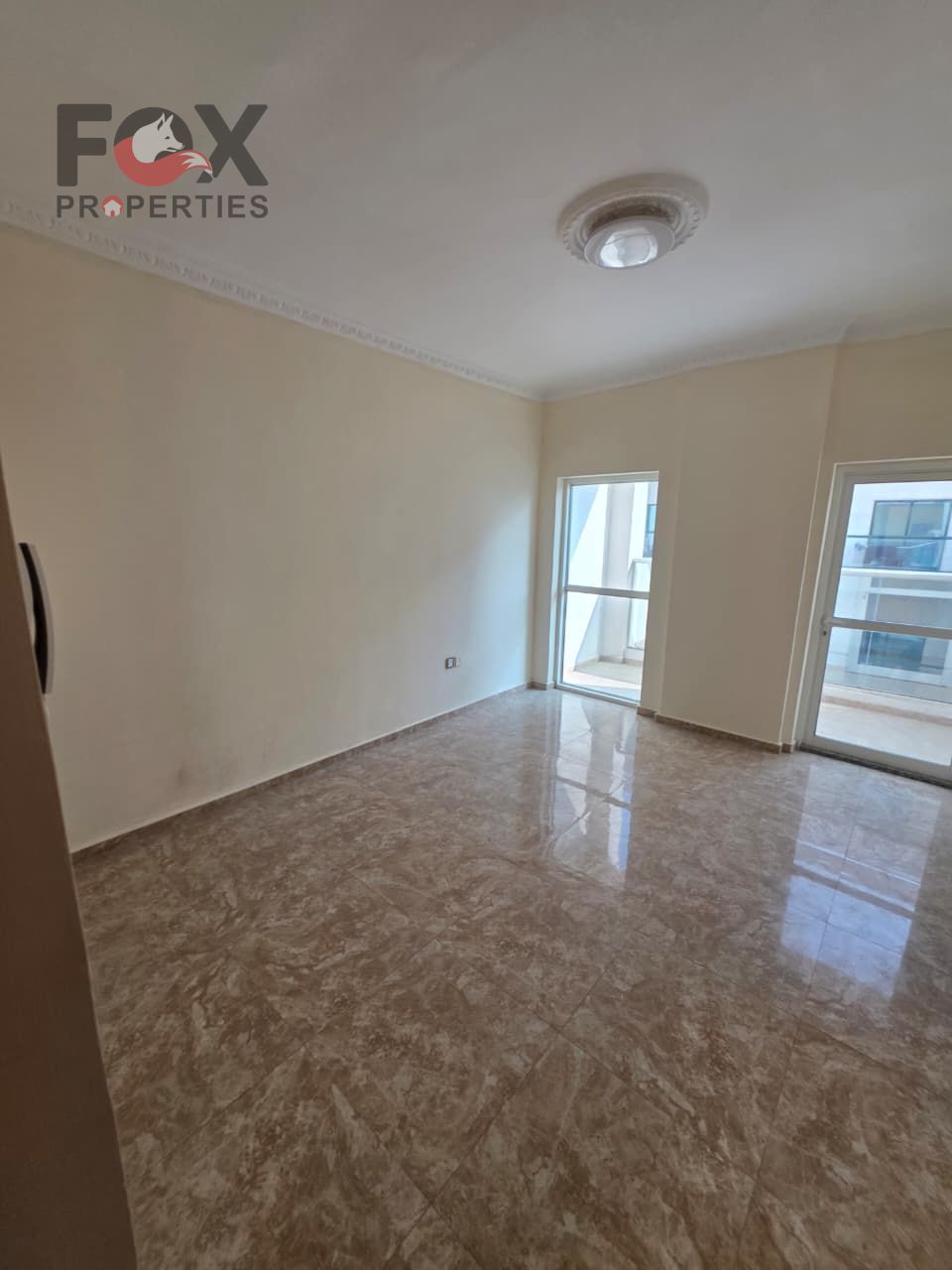 Two rooms and a hall for annual rent in Al Rashidiya 3