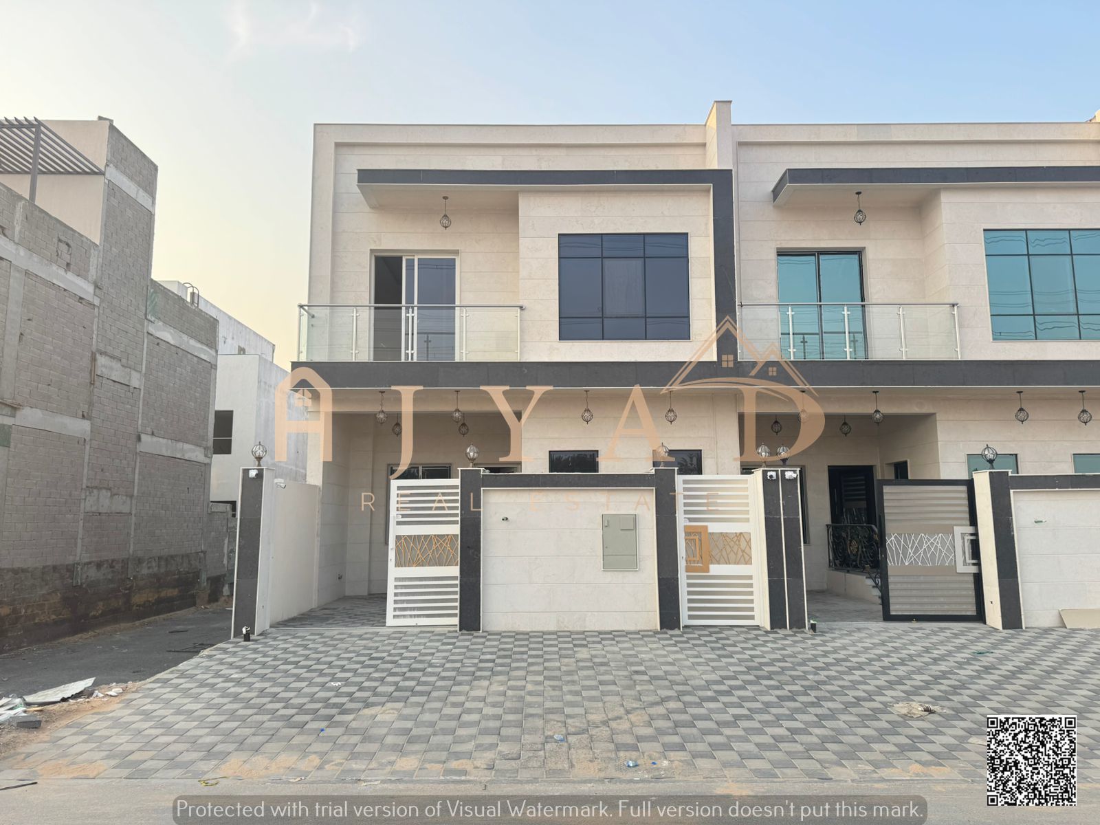 Villa for sale - Two floors and a rooftop - with a spacious courtyard and price including registration fees - near Sheikh Mohammed Bin Zayed Road with