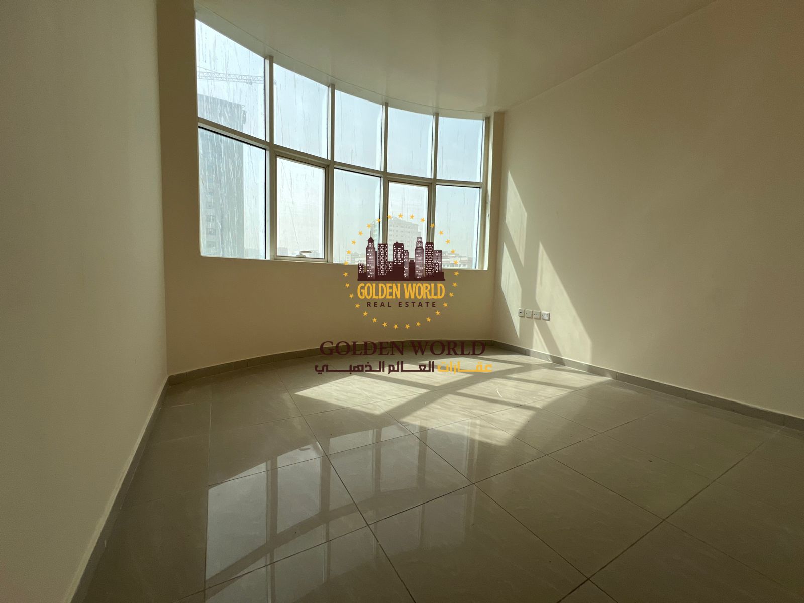 2BR apartment in Sharjah Al Qasimia near Mega Mall, panoramic view, 2 bathrooms, parking, flexible payment via Tabby, annual rent AED 40,000.
