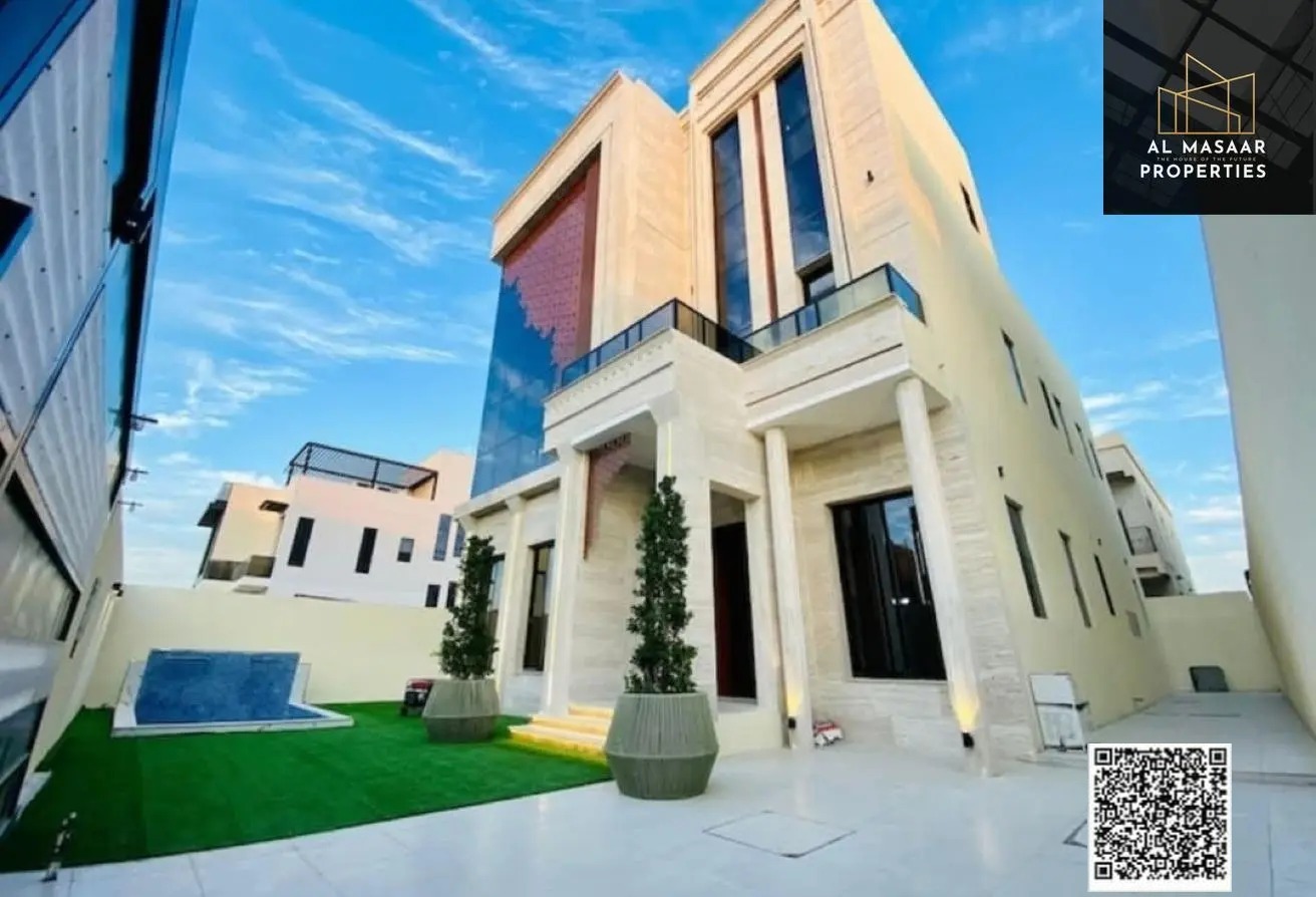 A villa at a price including registration and ownership fees on the main street, ready for occupancy in the most prestigious areas of Ajman, freehold