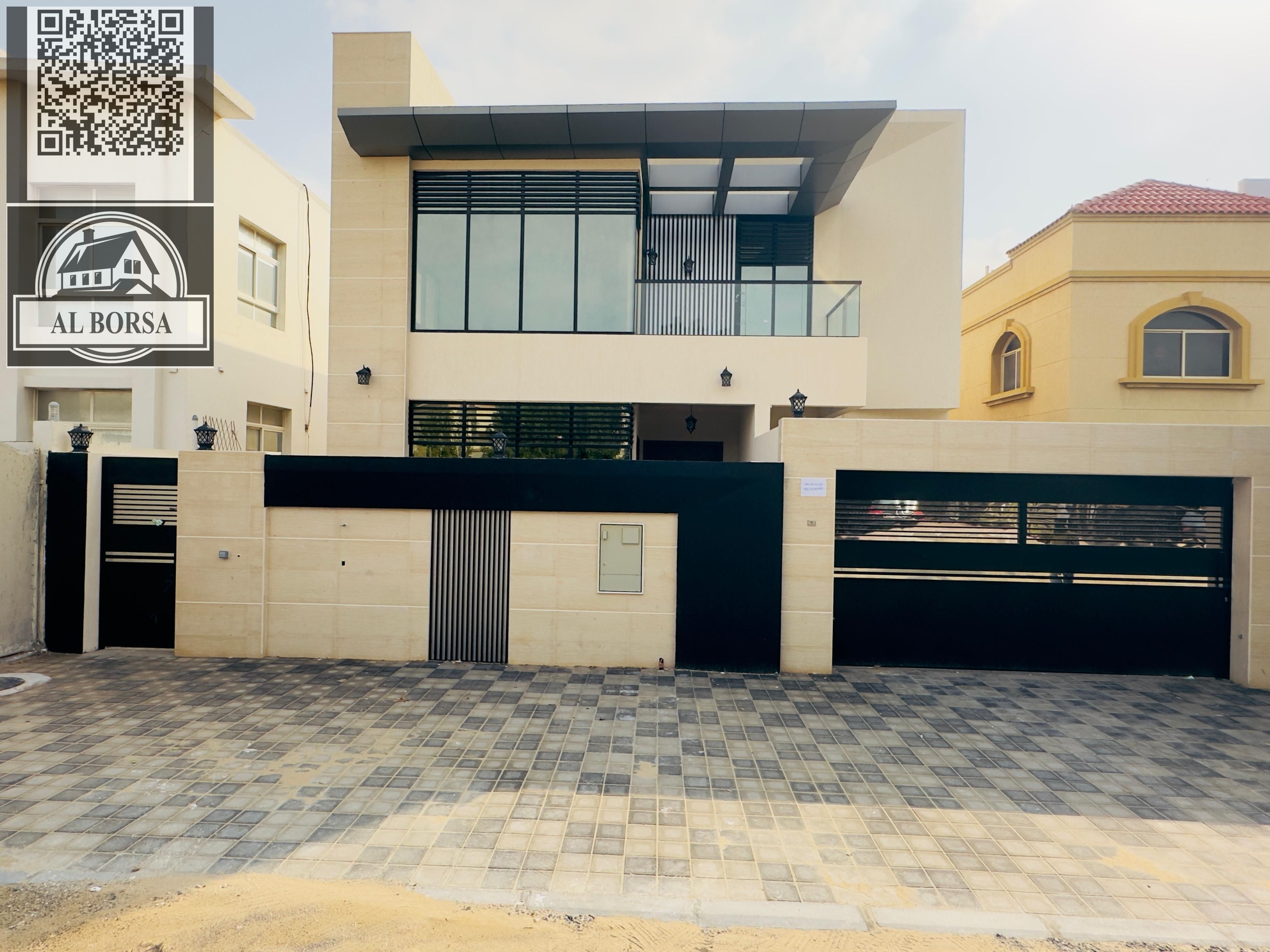For sale: Two-story villa – Super Deluxe finishing in Al Rawda 1, Ajman, 5 master bedrooms + Majlis + 2 living rooms + kitchen + maid's room and ya