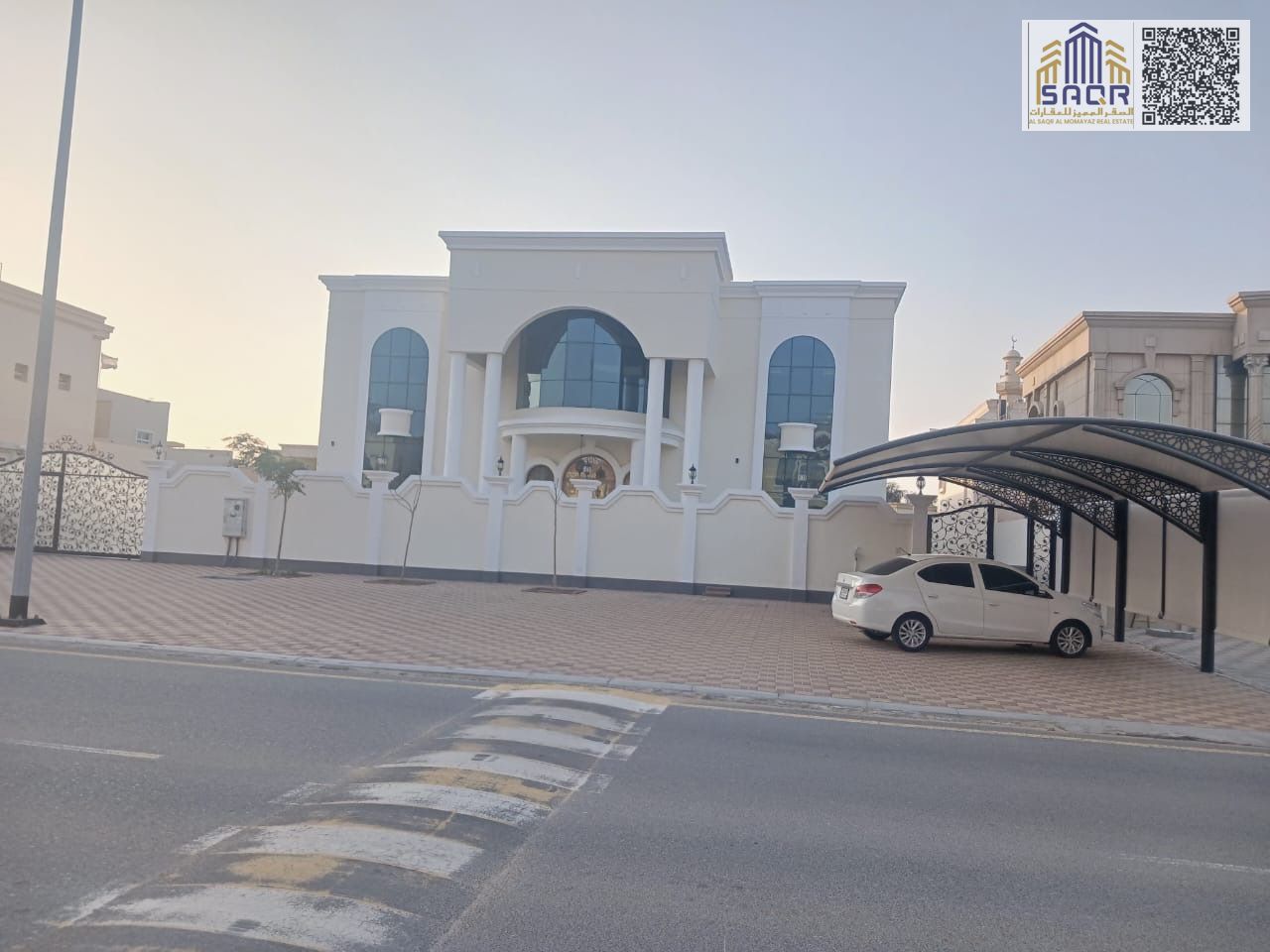 Villa for rent in Al-Ruqaib, 10,000 sq ft. Ground floor: Two spacious living rooms with ensuite bathrooms, a large majlis (traditional Arabic sitting room) with a separate bathroom, two master bedrooms, and a kitchen. First floor: Five master bedrooms wit