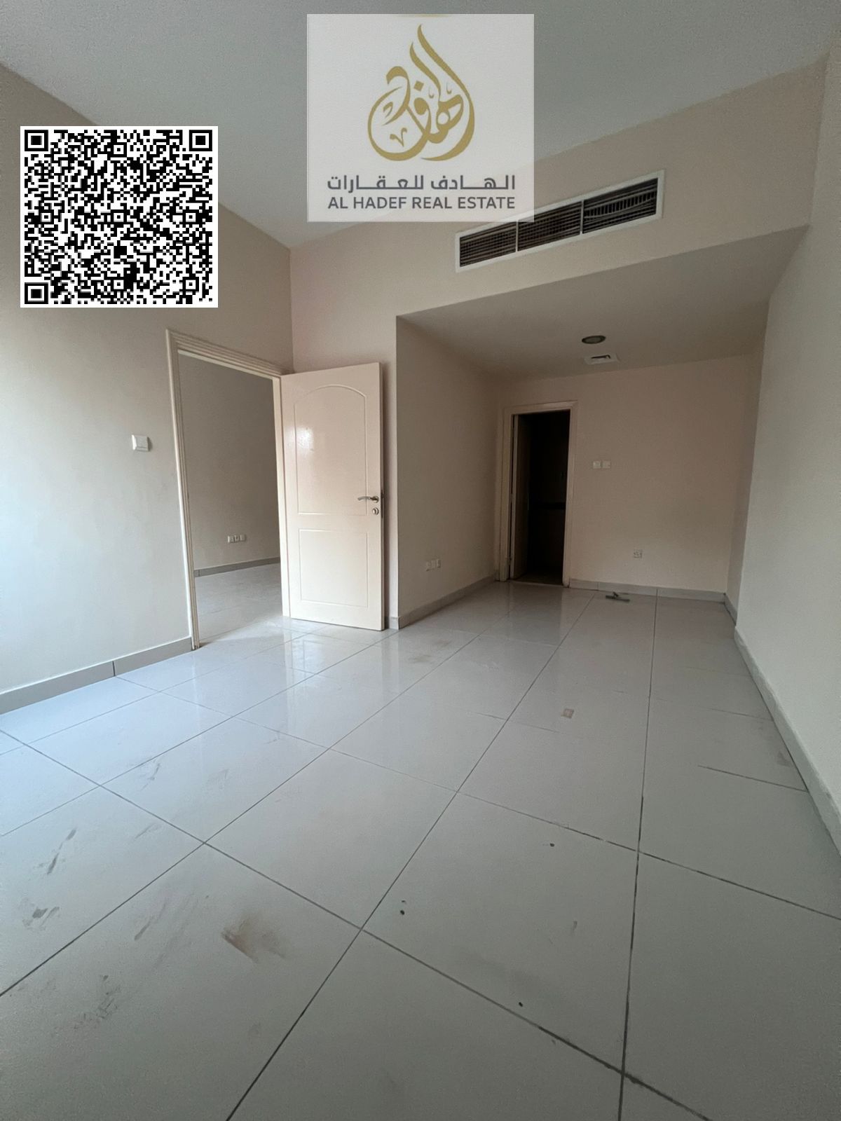 One bedroom and living room with two bathrooms and a built-in wardrobe, no balcony. Annual rent 29,000 AED, payable in four installments. Al Nuaimiya
