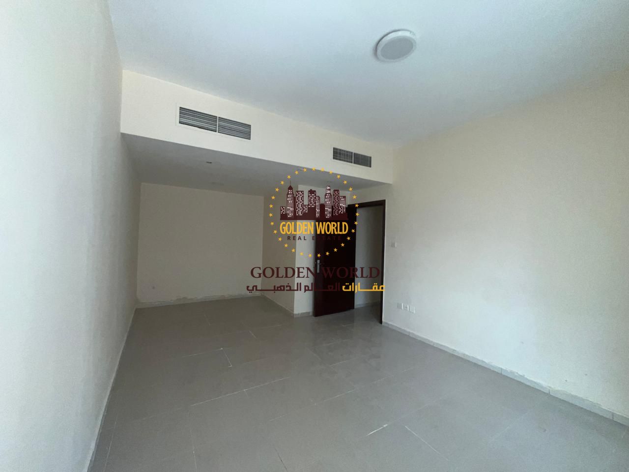 2BR apartment with living room in Al Nahda Sharjah, 2 bathrooms, closed view. Rent 42,000 AED, payable in 4 or 6 cheques.