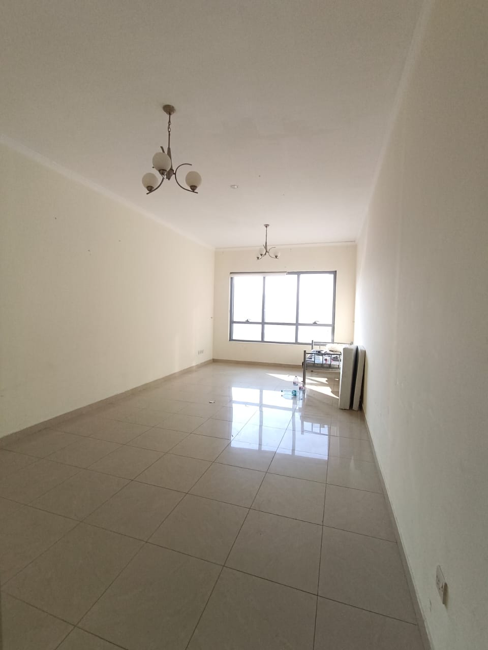 For annual rent in Sharjah, Al Majaz 2 area: 3 bedrooms, a separate living room, 3 bathrooms, and a balcony. Prime location, very close to Al Majaz Co
