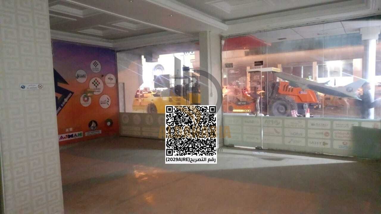 An excellent opportunity to rent a spacious commercial shop in Rashidiya 1, featuring a prime location directly on the main road, ensuring high visibi