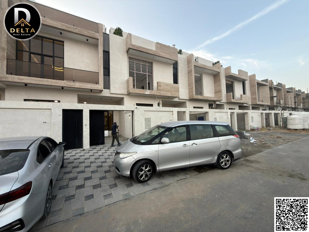 Modern Townhouse Villa in Al Yasmeen Area, Ajman. Two floors plus a roof terrace. Registration and ownership fees included. Land area: 1800 sq ft.