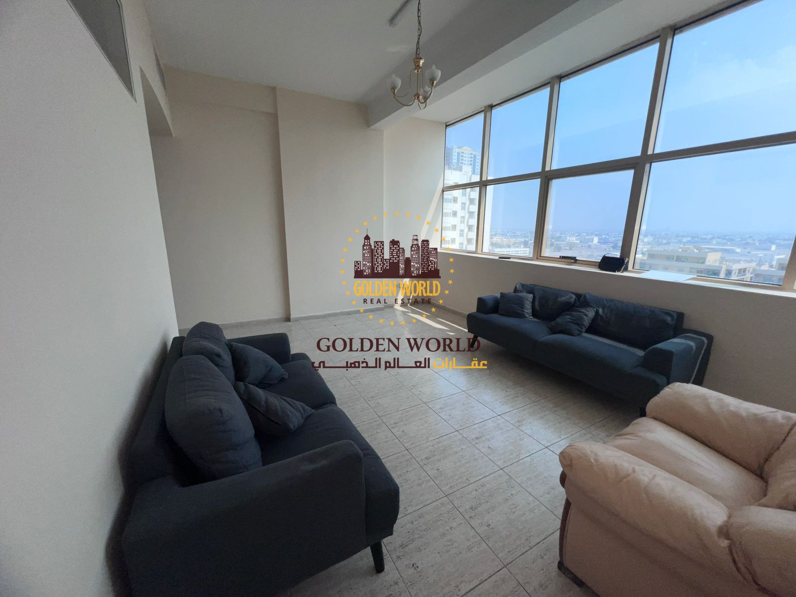 1BR apartment with living room in Al Majaz, free AC, paid gym, open view, no parking. Rent AED 37,000, 4 or 6 cheques.