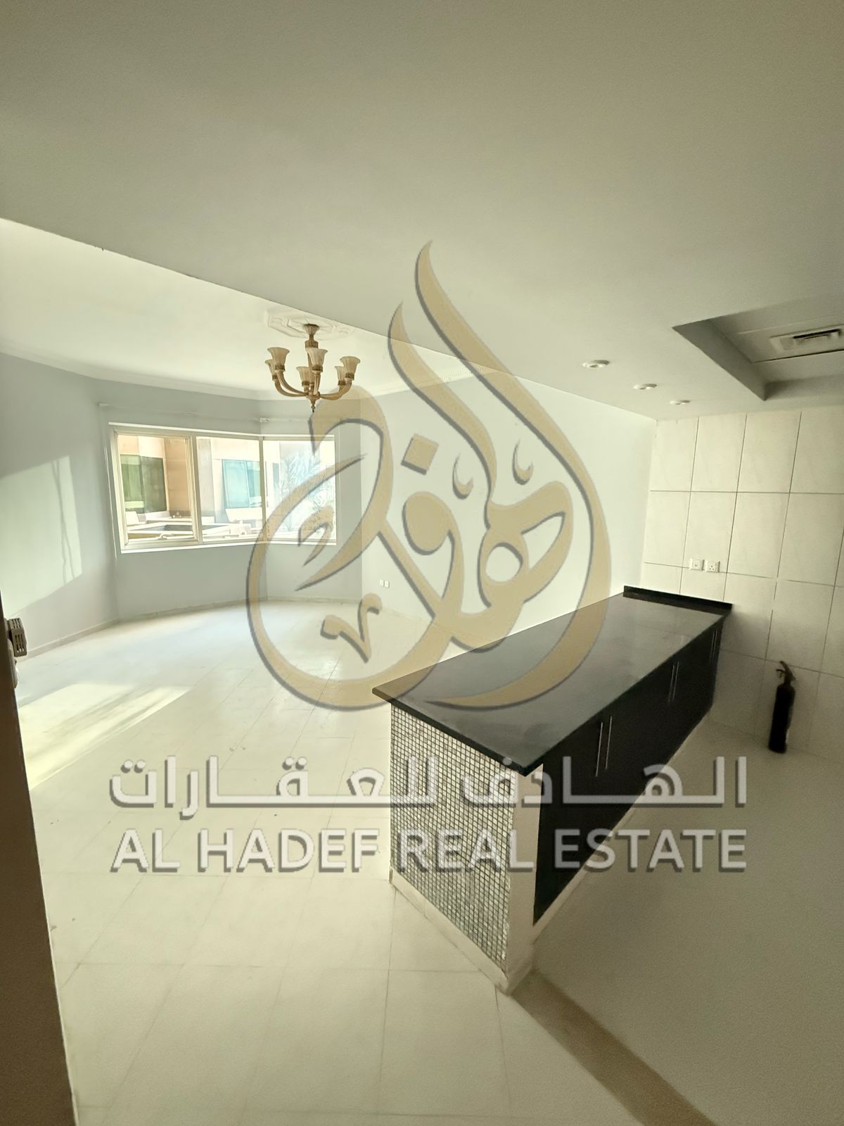 For annual rent in Sharjah – Al Khan area, a very special one-bedroom apartment with living room, ideal for long-term stay, featuring a comfortable la