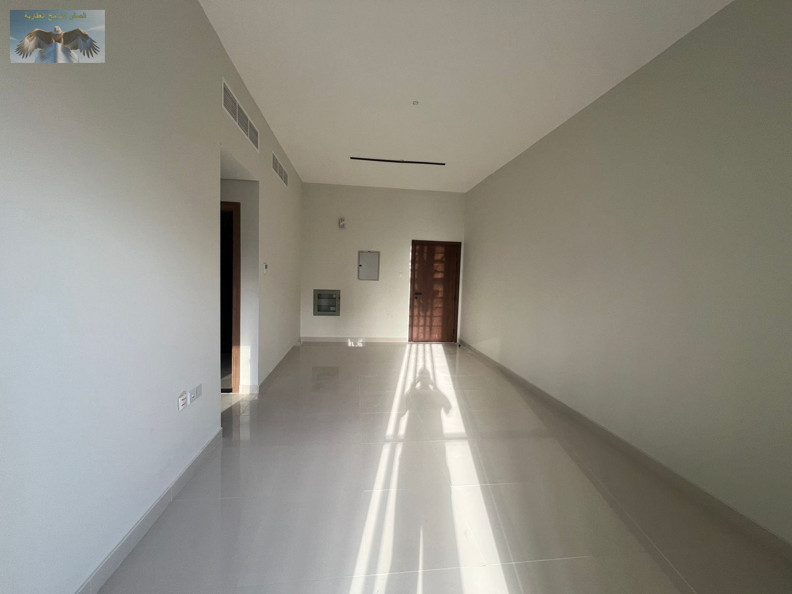 Beautiful two-bedroom apartment with a living room, first occupancy, next to Al-Hikma School, with built-in wardrobes and very distinctive finishes at