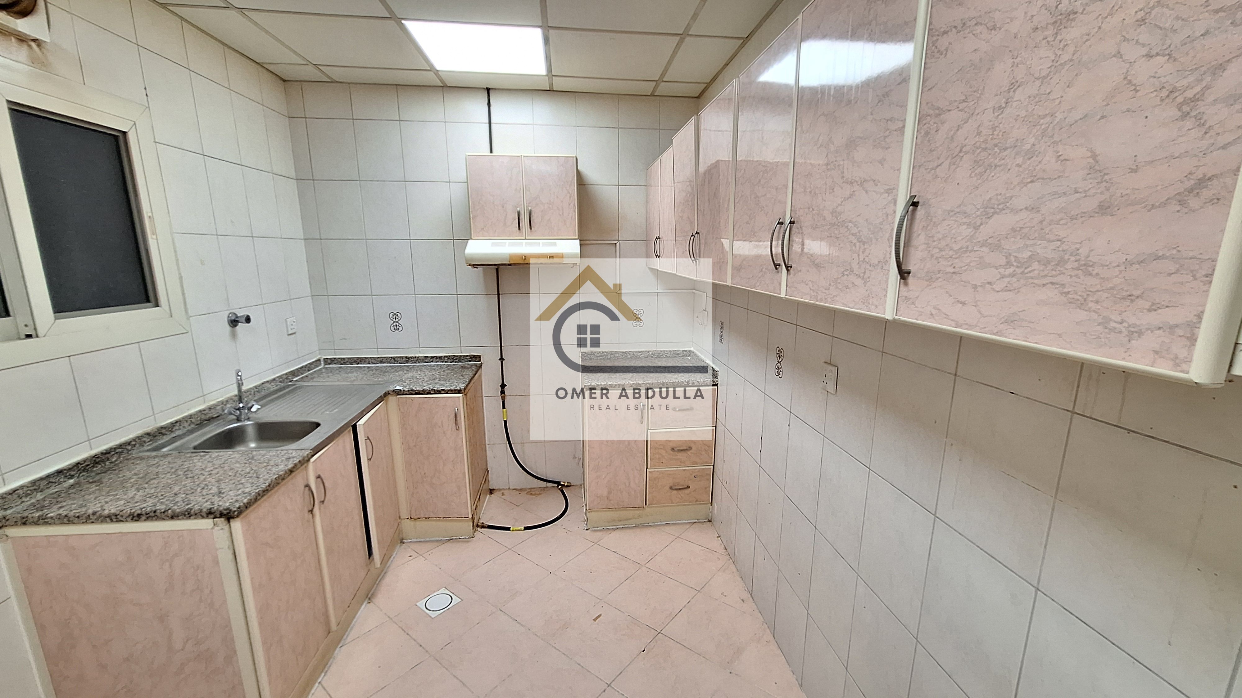 Super offer lavish 1bhk apartment with balcony and with 2 bathrooms in Muweilah area