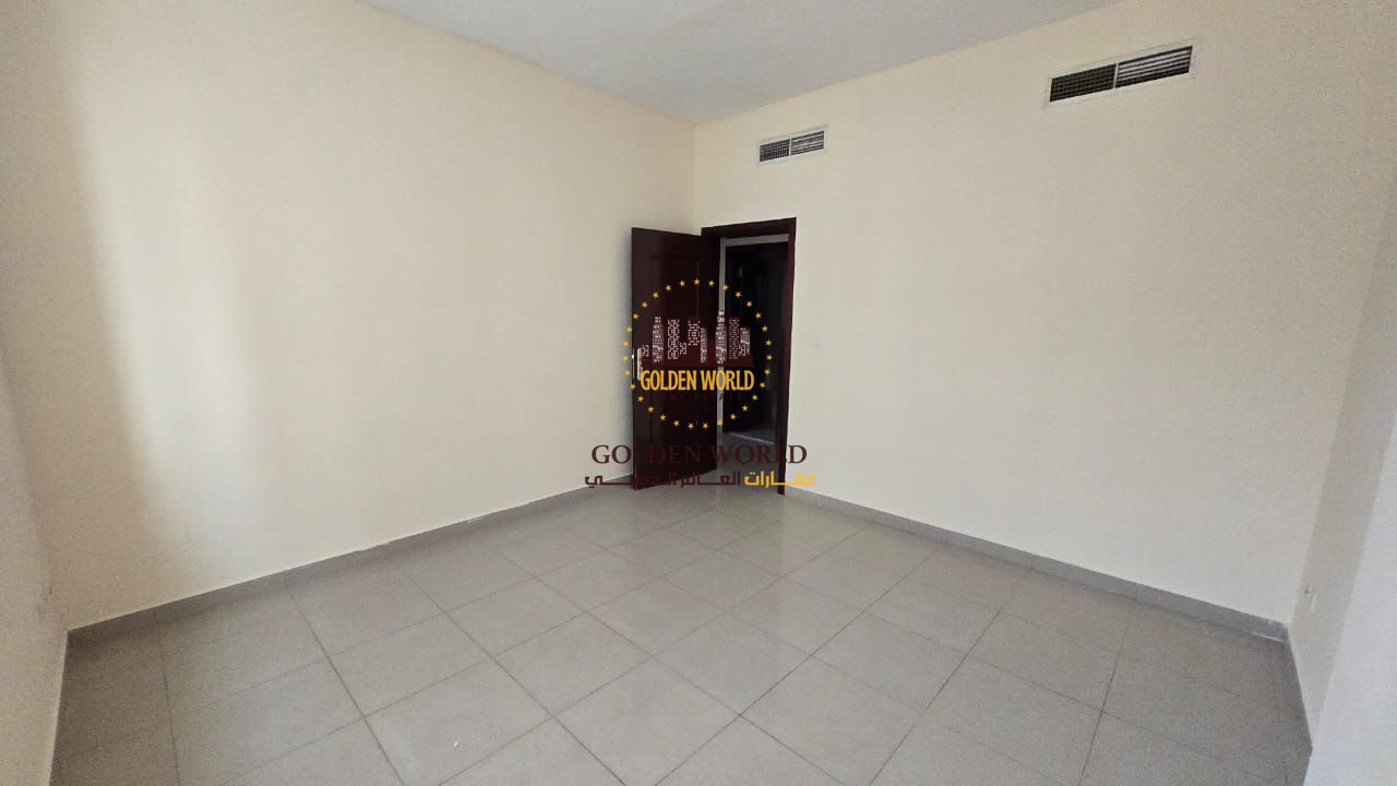 Two-bedroom apartment with living room in Al Khan, central AC, two bathrooms, near Dubai exit and services. Handed over after maintenance. Rent AED 44