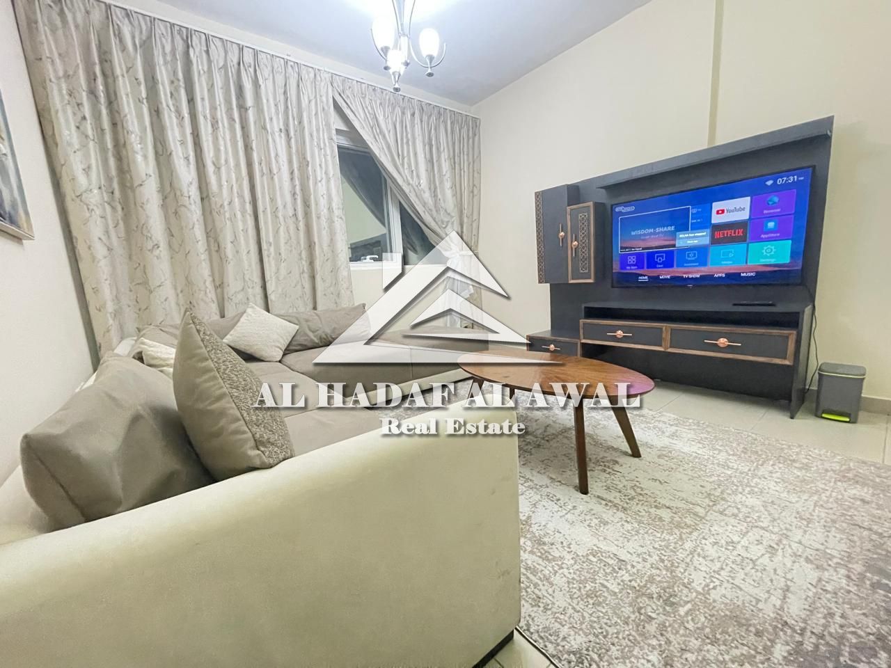 A one-bedroom apartment is now available in the Al Taawun area, a prime and vibrant location close to all essential services such as shops, restaurant