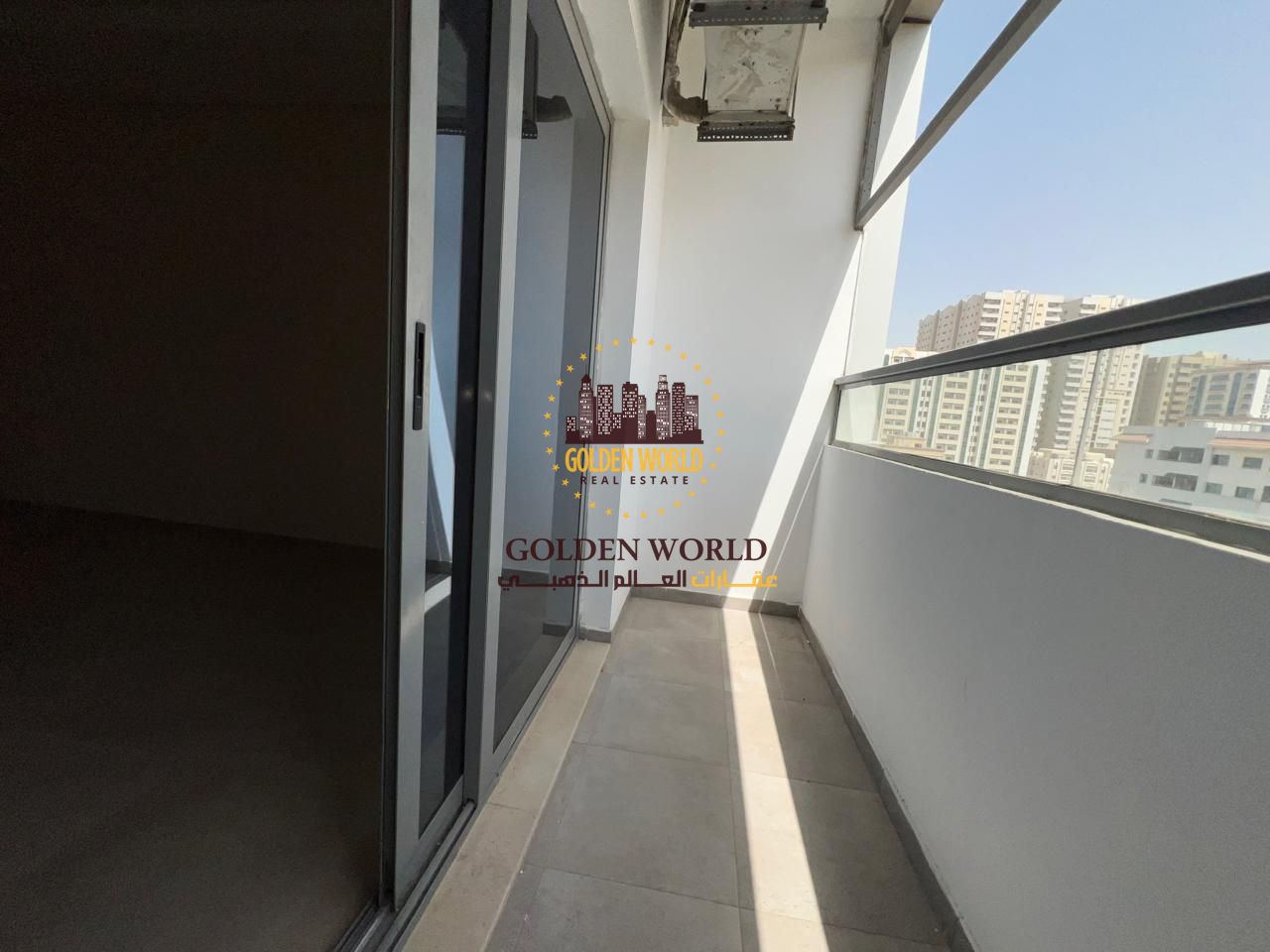 2BR apartment with living room, balcony & parking in Abu Shagara near Mega Mall, 2 bathrooms, open view. Rent AED 42,000, 4 or 6 cheques.