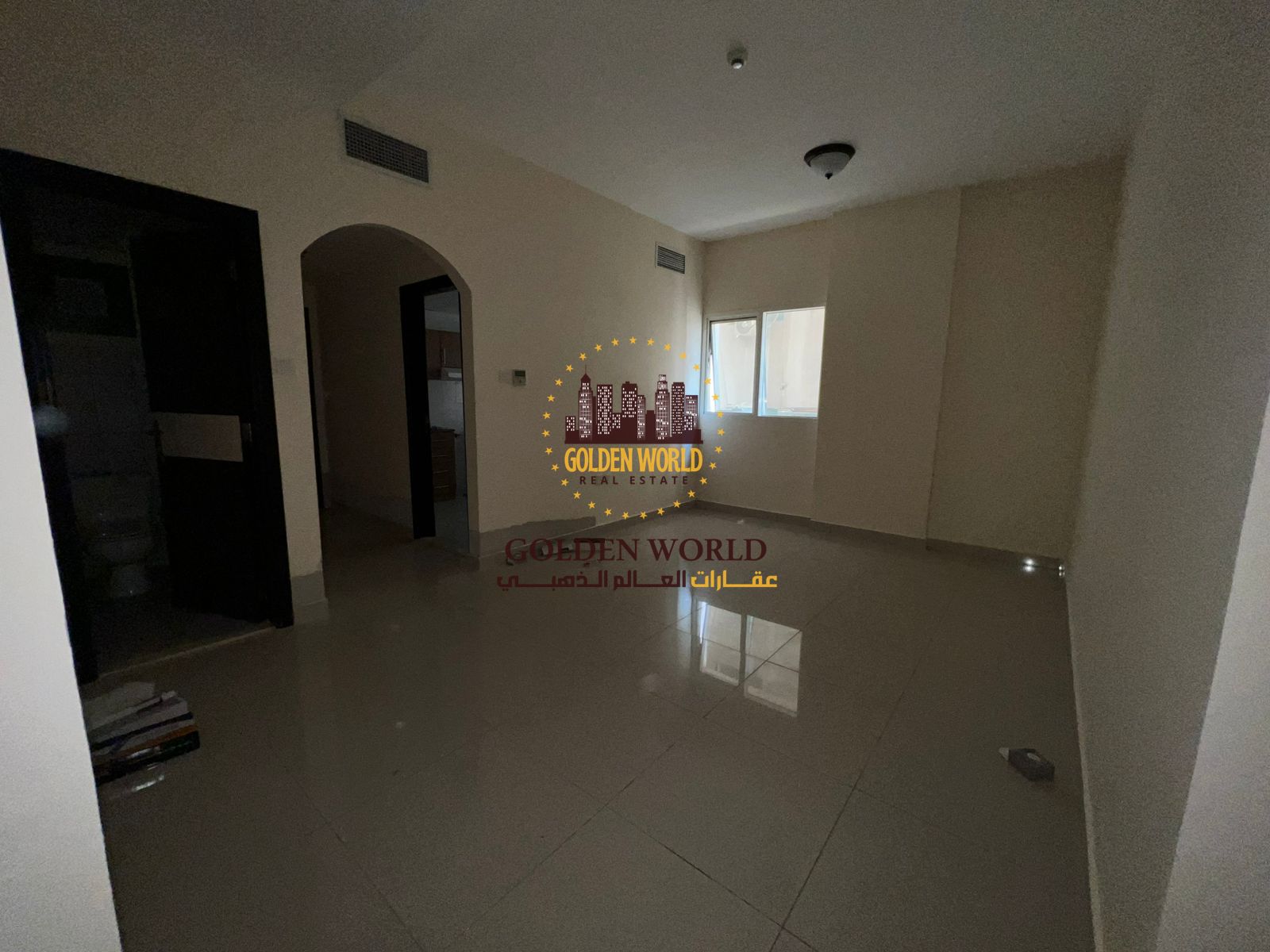 Clean 1BR apartment with living room in Al Taawun, 2 bathrooms, prime location. Rent AED 35,000, 4 or 6 cheques.