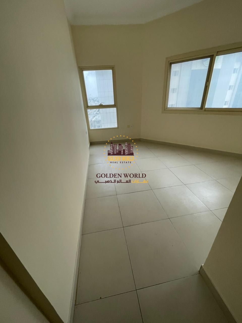 3BR apartment with living room in Al Butina, small balcony, central AC, 3 bathrooms, master room, indoor parking. Rent AED 50,000, 4 or 6 cheques.