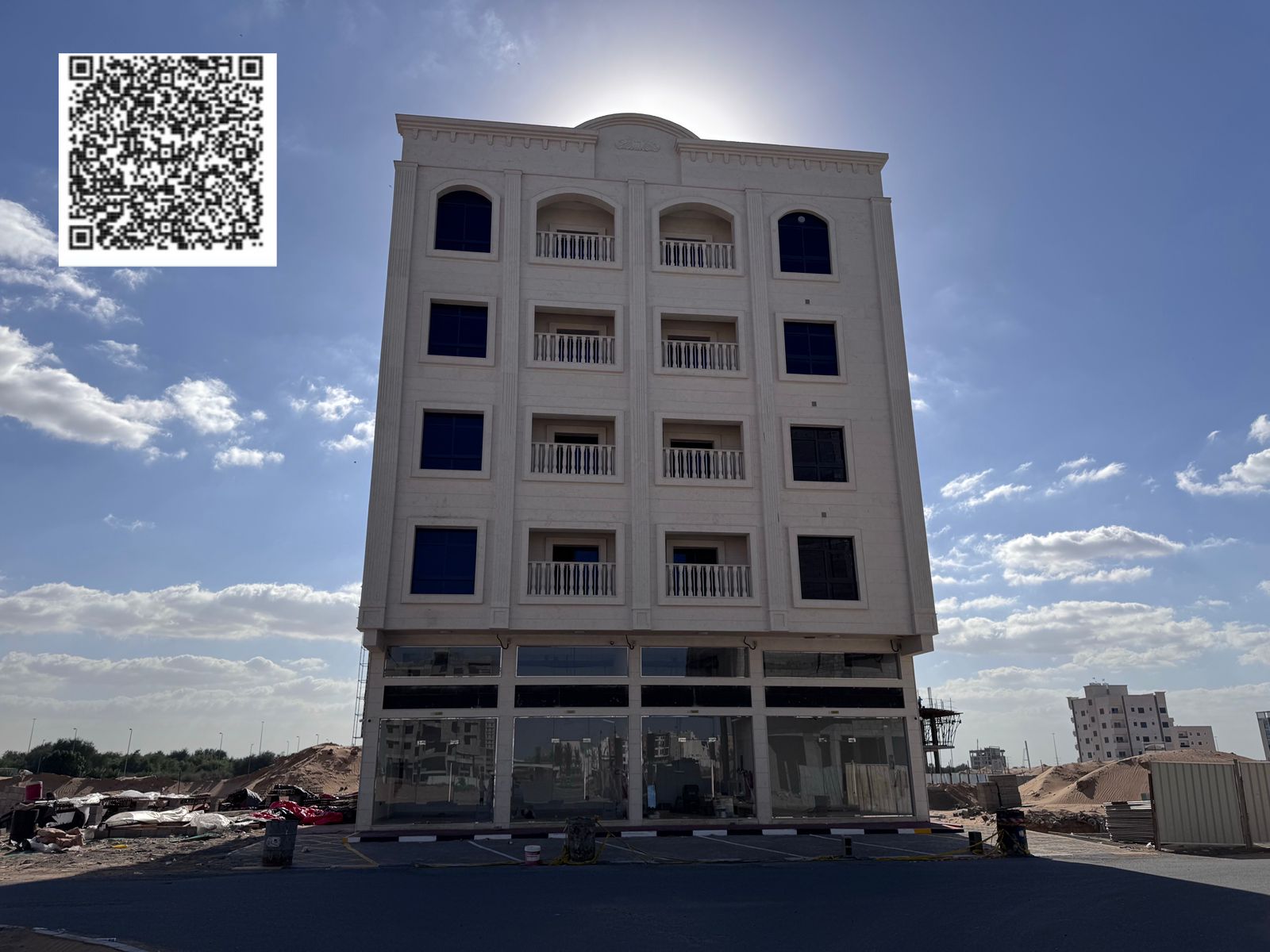 New building for sale in Ajman, Al Alia Global area. Residential/commercial permit for ground floor + 4 floors. Land area: 4300 sq ft. Built-up area: