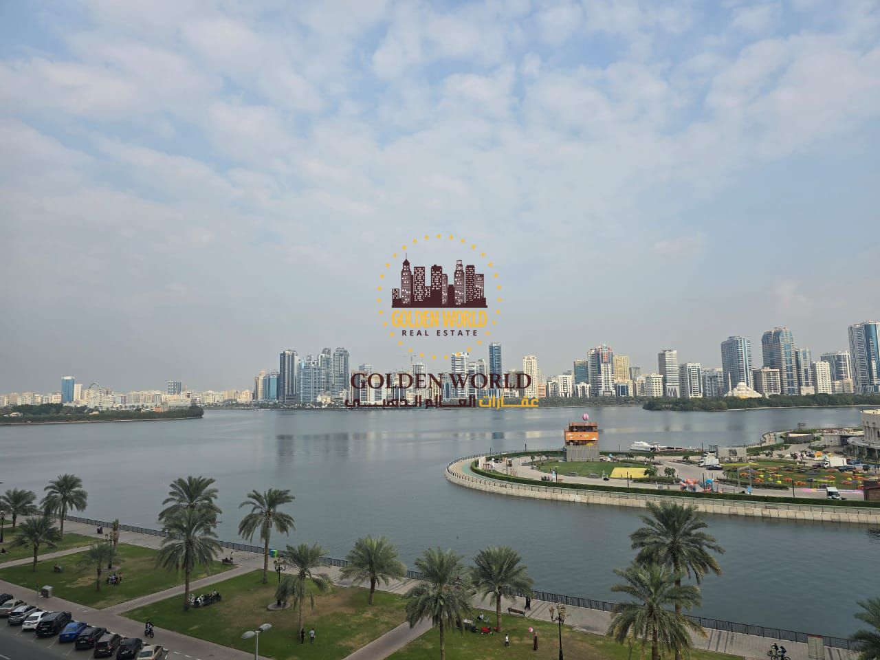 4BR + 2 living rooms in Al Majaz 3, full sea view, 5 bathrooms, master maid room, free parking, free AC, rent AED 115,000, 4-6 cheques.