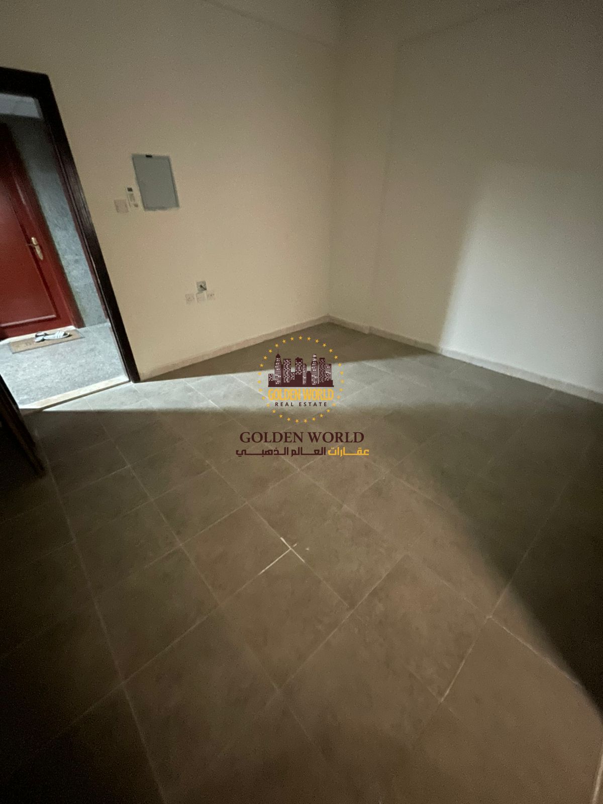 Studio in Al Nasiriya with split AC, balcony, small kitchen, ground parking. Security by cheque. Rent AED 16,000, 2 cheques, suitable for families or