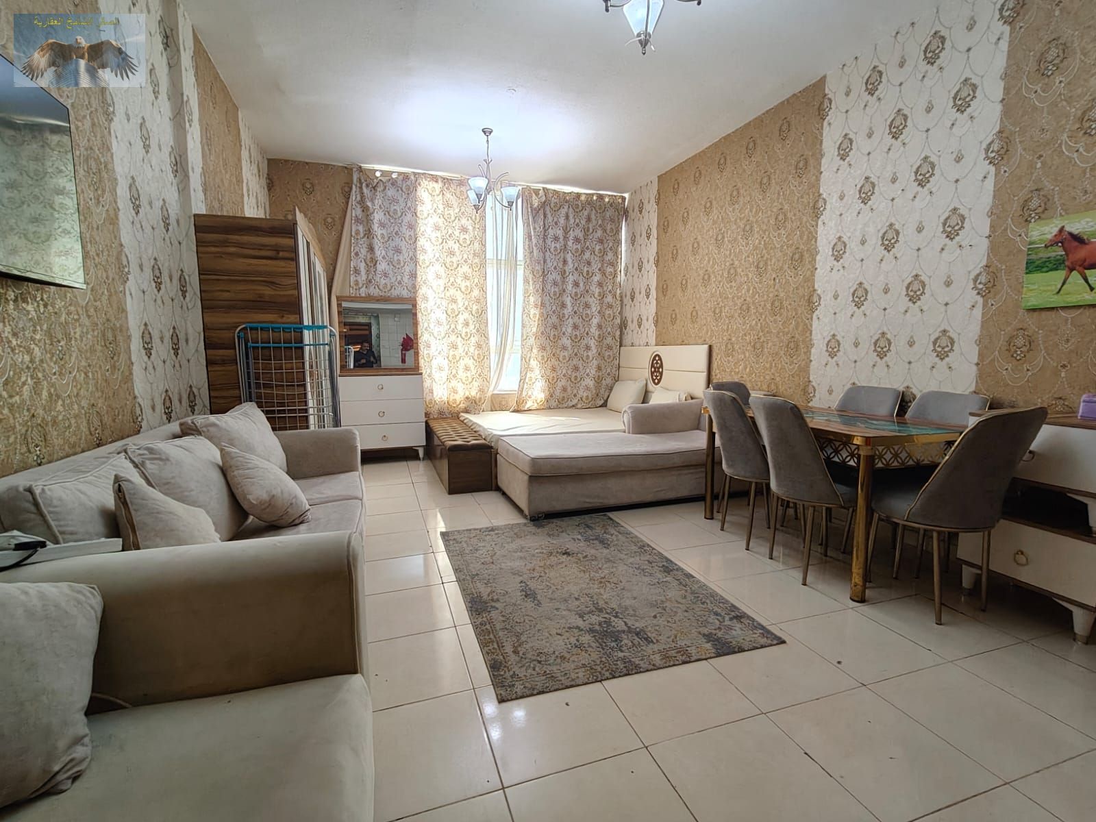 Furnished studio for rent in Orient Towers Mina Road Ajman clean furniture spacious layout with gym swimming pool private parking utilities included
