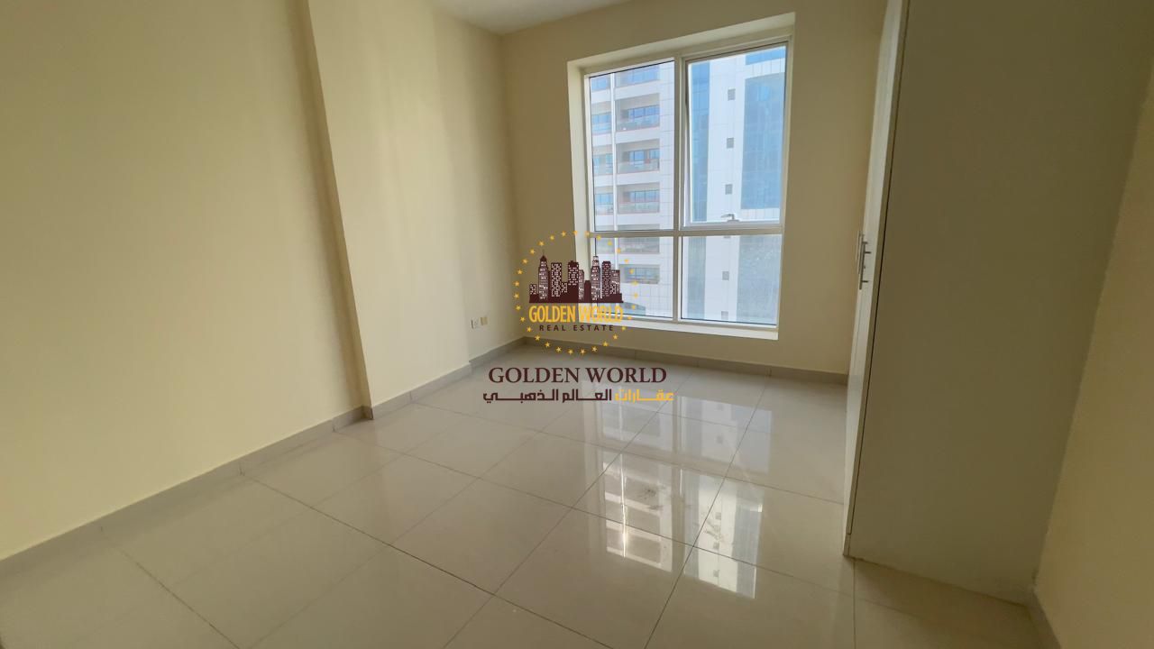 2BR + living room apartment with balcony in Al Majaz 2, 2 master bedrooms, guest bathroom, annual rent AED 48,000, parking, 4 cheques.
