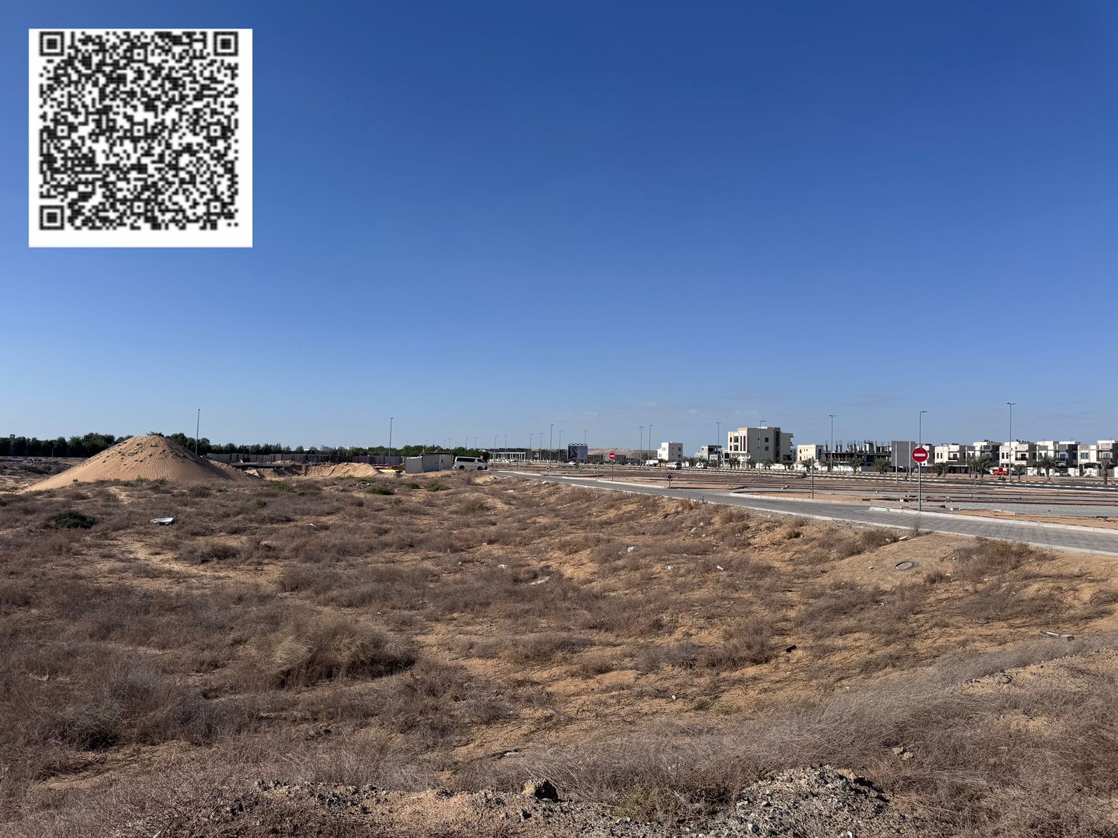 Land for sale in Ajman, Al Alia area, residential/commercial. Building permit: Ground + 5 floors. Land area: 1250 square meters (approximately 13455 s