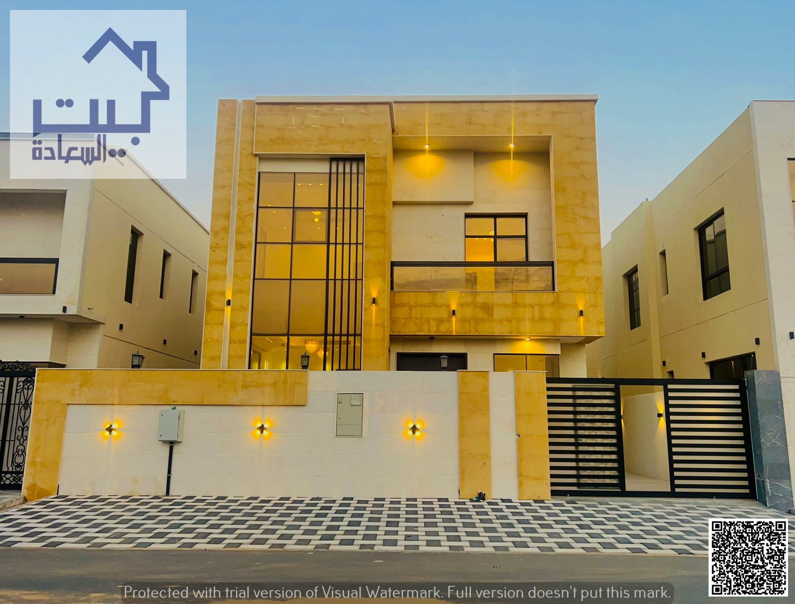 Modern villa for sale in Al Yasmin, Ajman, including water and electricity, directly on the main road, freehold ownership.
