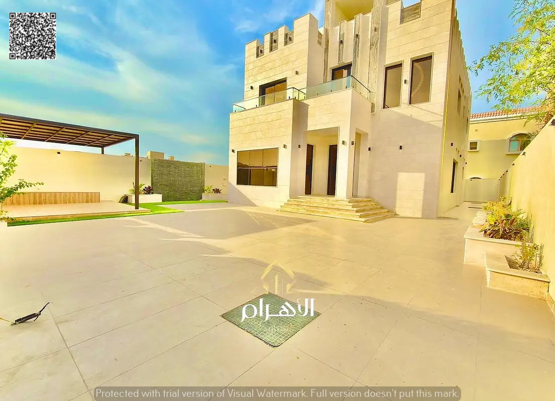 Villa for sale in Al Muwaihat 1, Ajman, with a spacious area and luxurious design, including registration and ownership fees. Freehold ownership for a