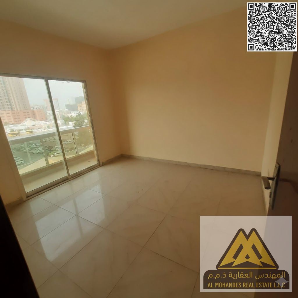 Balcony with an open view | Central air conditioning | Prime location close to all services and easy access to Sharjah and Dubai