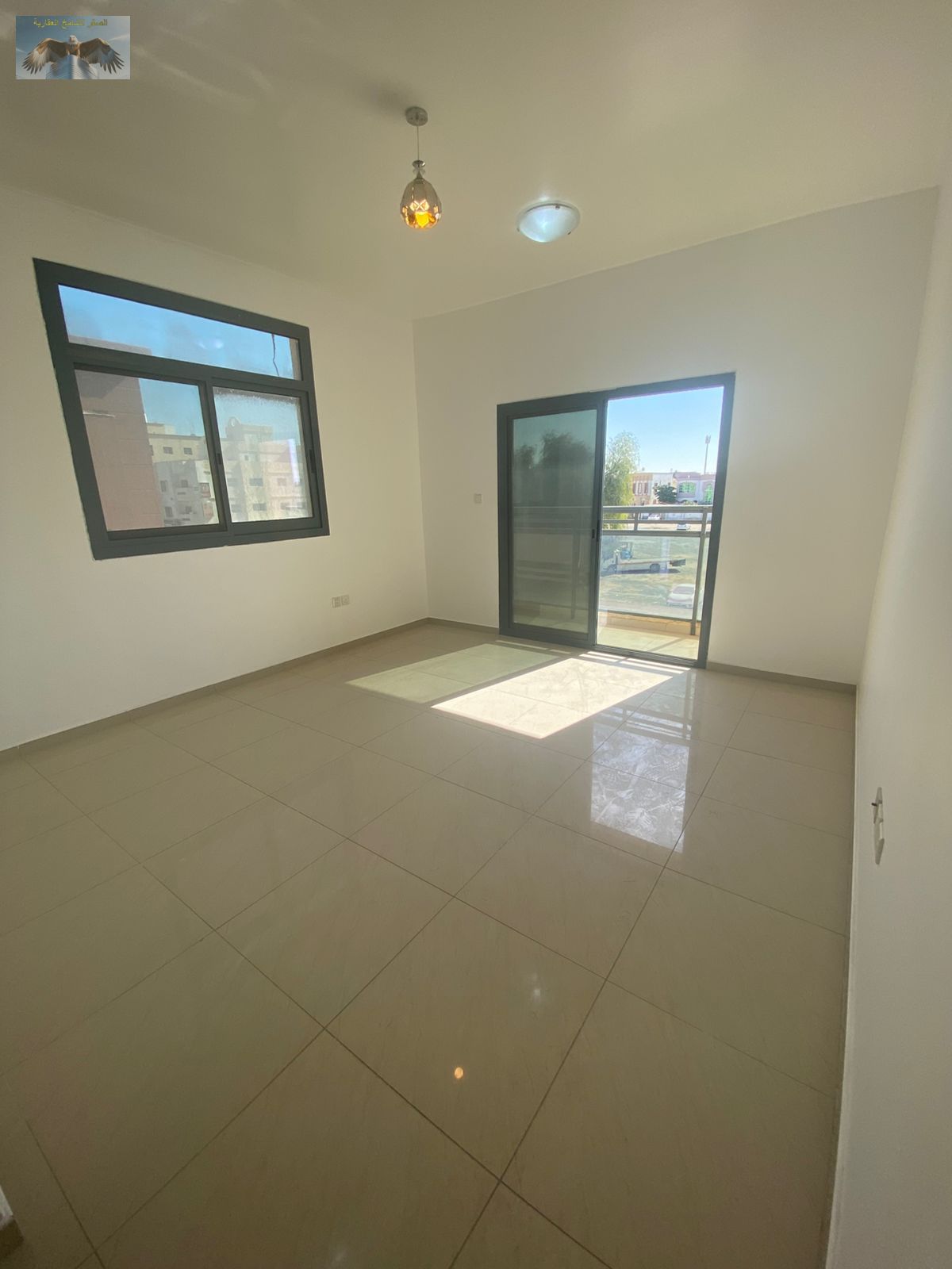 An excellent opportunity to live in a two-bedroom apartment with a very large living room, located in Al Muwaihat 2 on a main street, giving you easy
