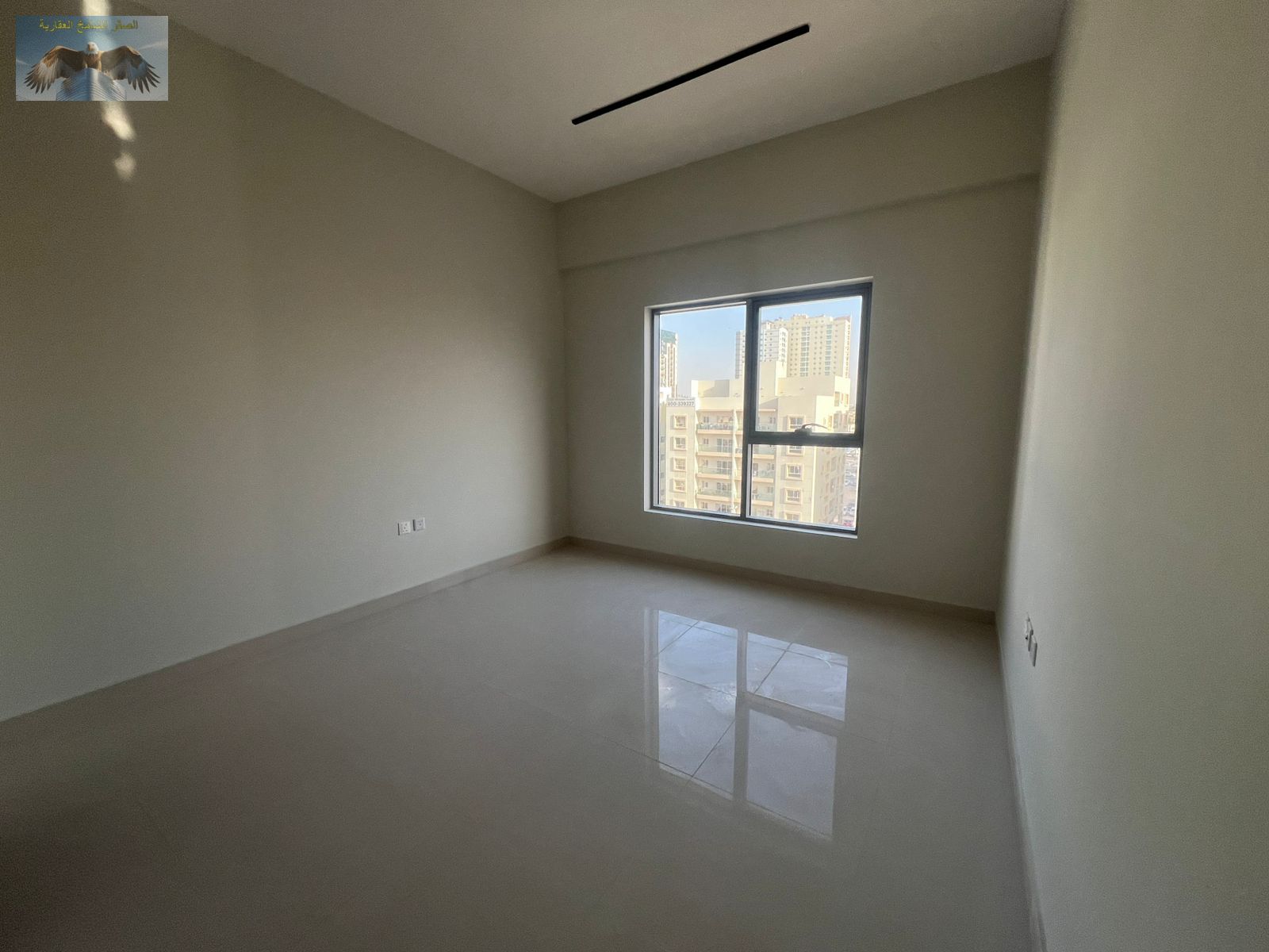 A brand new, fully furnished, three-bedroom apartment with a living room, never before occupied. Located in a prime location in Al Nuaimiya 1, next to