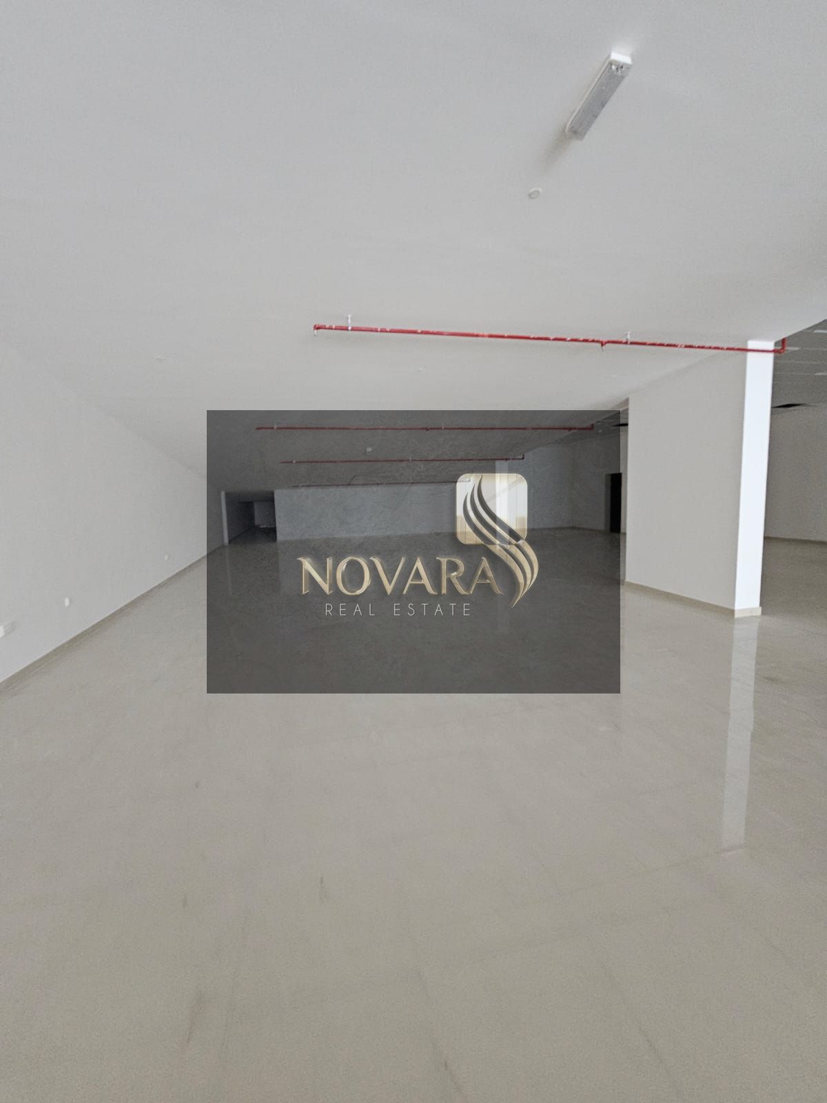 "Premium 13,000 sq. ft commercial showroom for annual rent on a main street in Al Rashidiya 1, Ajman – ready for operation"
